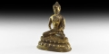 Tibetan Gilt Sitting Buddha Statuette