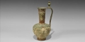 Islamic Khorasan Bronze Jug with Calligraphic Text and Poppy Handle