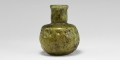Frankish Pinched Green Glass Bottle