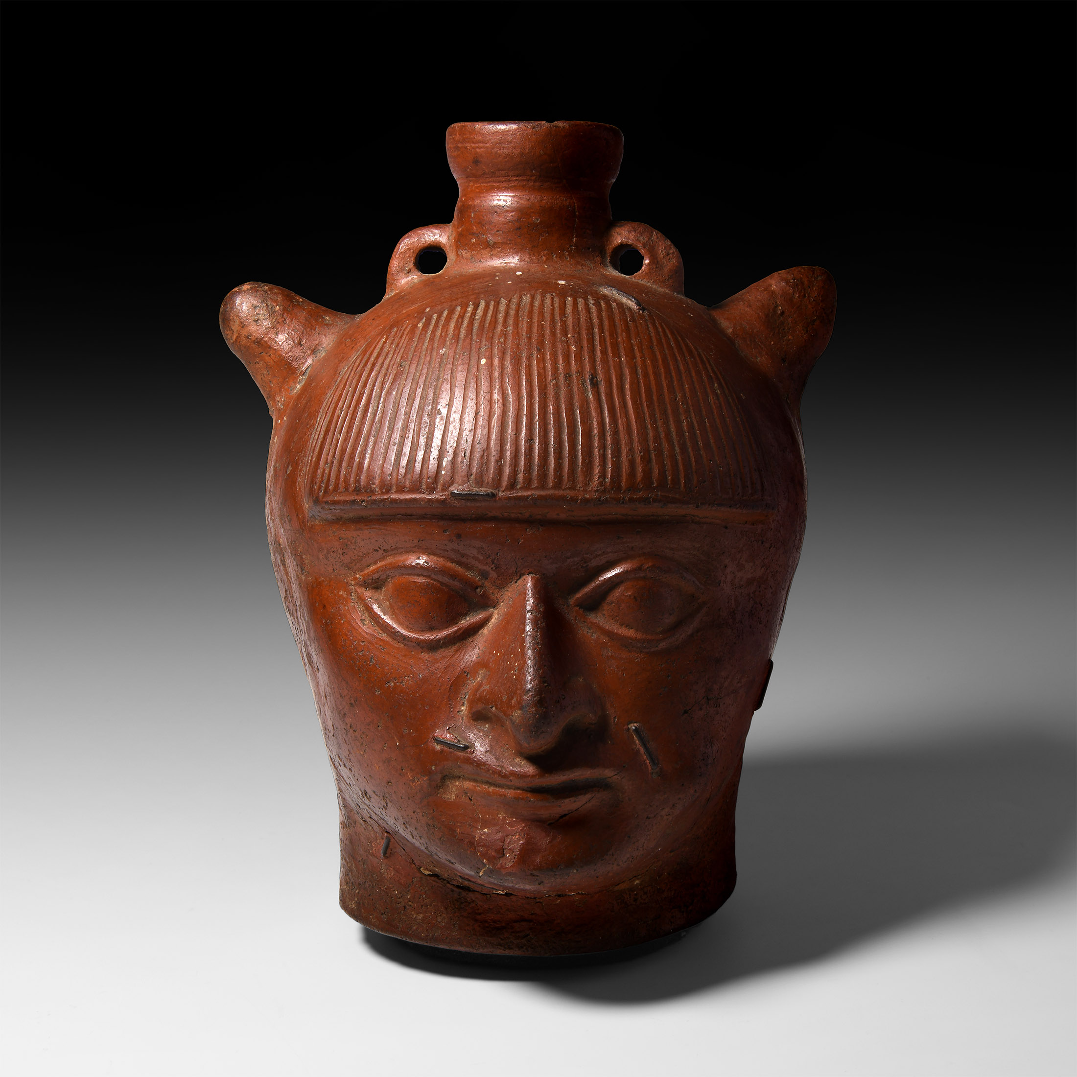 Roman North Africa Oinophoros Redware Wine Jug with a Satyr