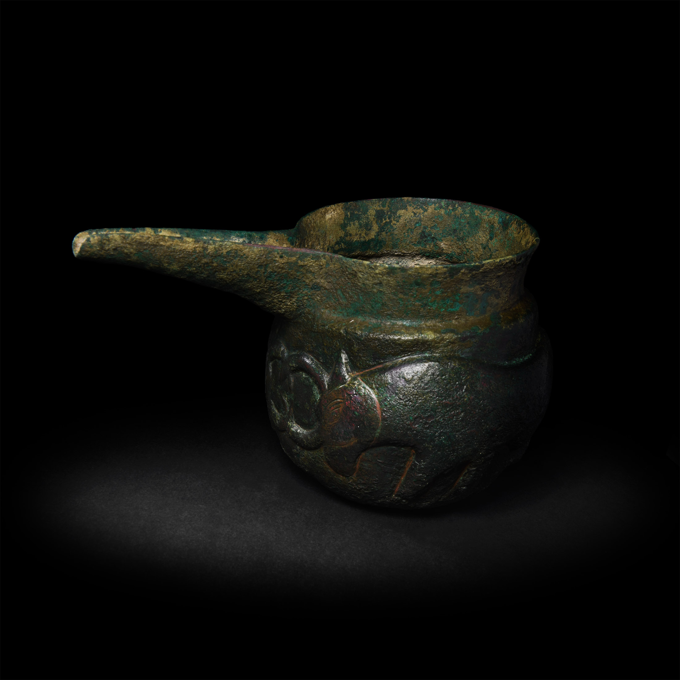Luristan Spouted Vessel with Attacking Bulls