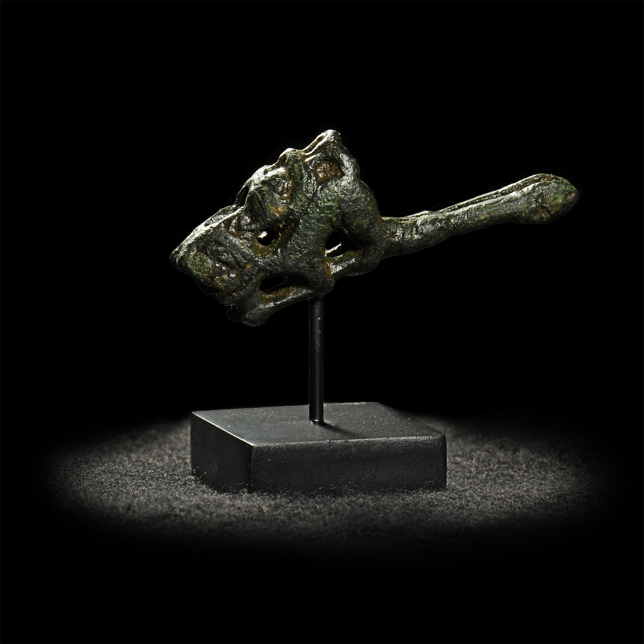 Anglo-Norman Bronze Scabbard Terminal with Advancing Beast