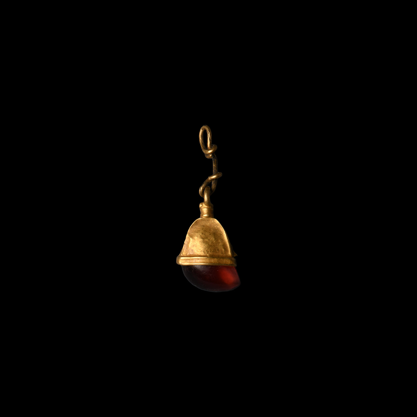 Viking Age Gold Elf Shot Pendant with Garnet