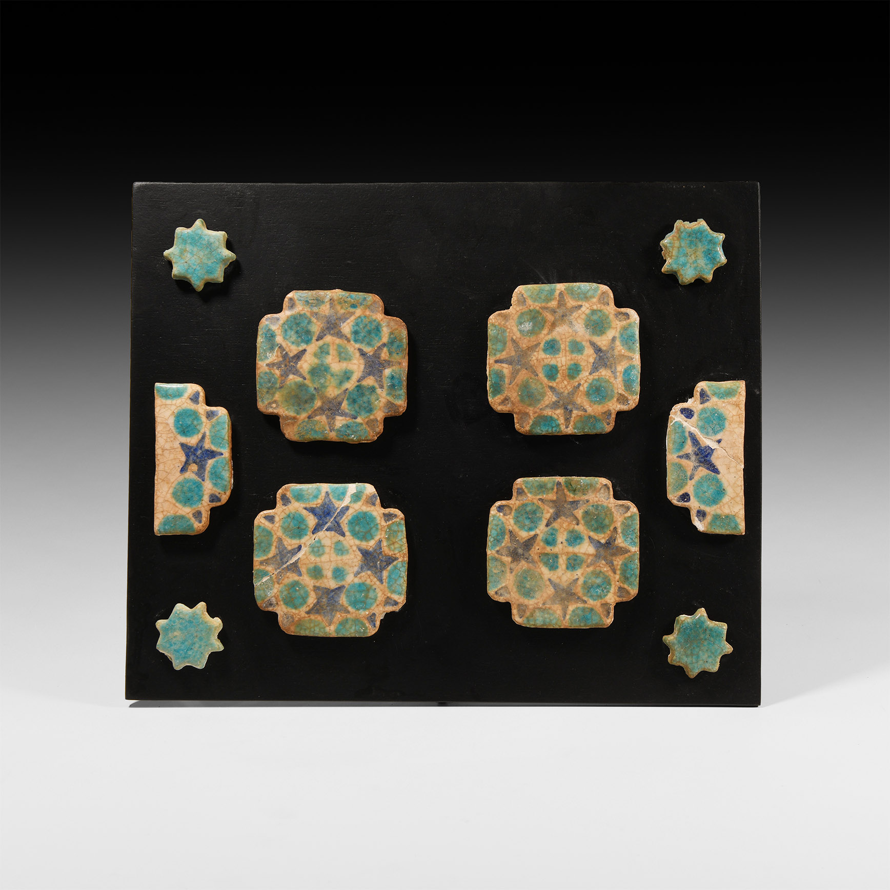 Western Asiatic Glazed Ceramic Floor Tile Group with Stars