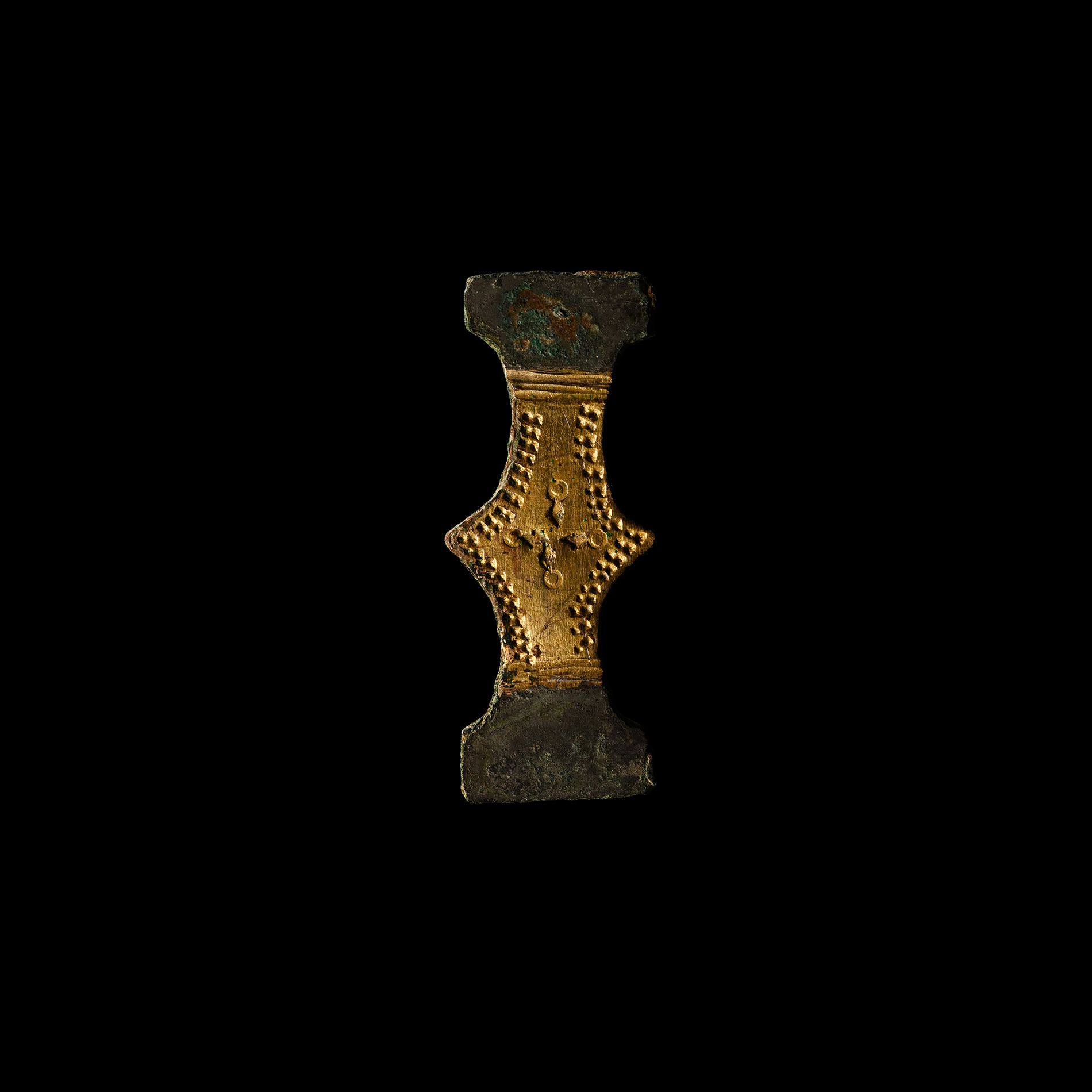 Anglo-Saxon Gilt Bronze Double-Axe Shield Mount