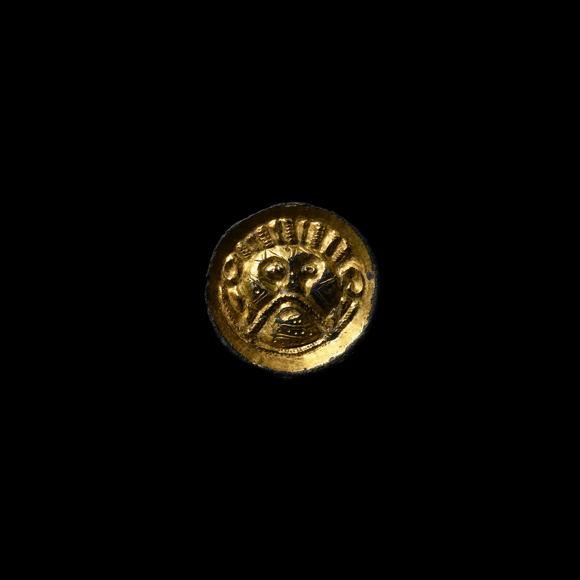 Anglo-Saxon Chip-Carved Saucer Brooch with Face of Woden