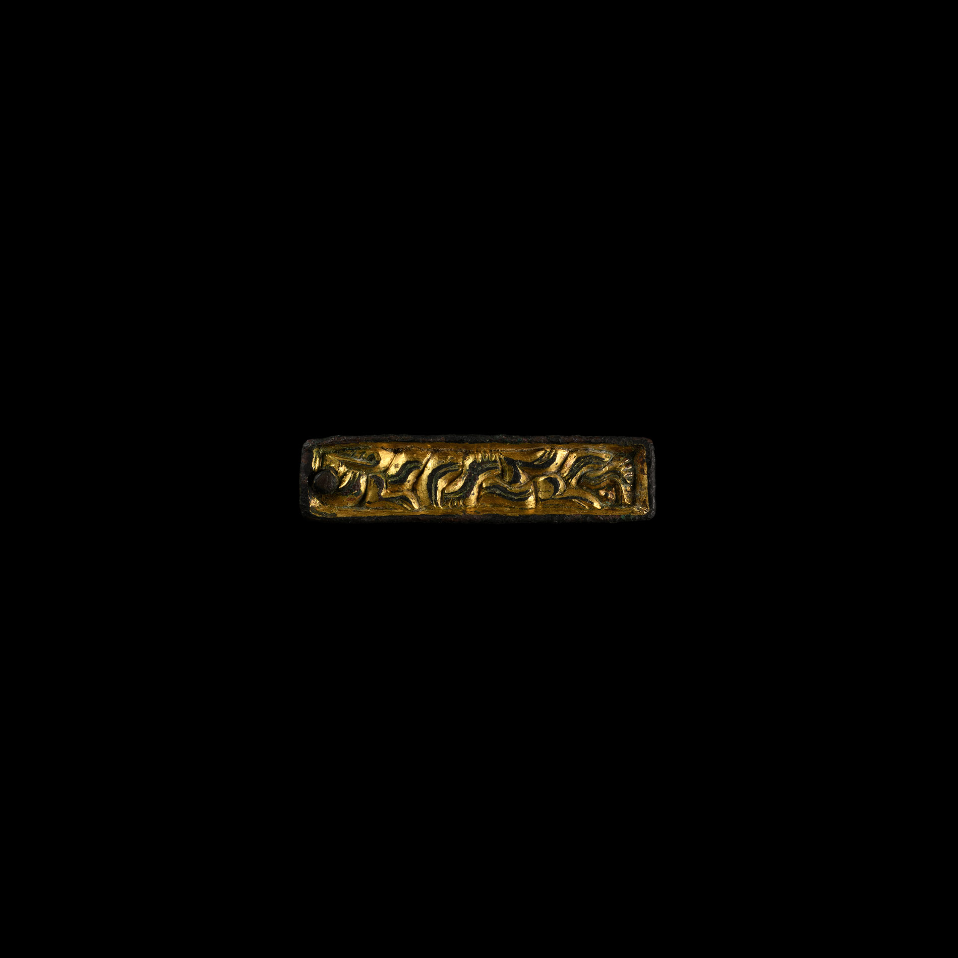 Anglo-Saxon Gilt Chip-Carved Beast Mount