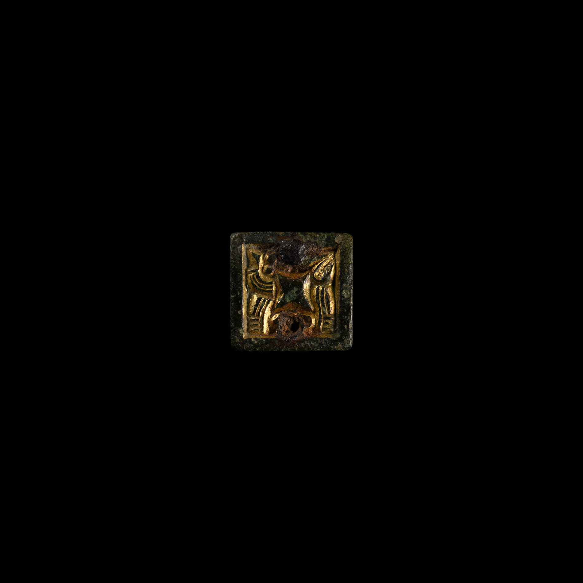 Anglo-Saxon Gilt Chip-Carved Beast Mount