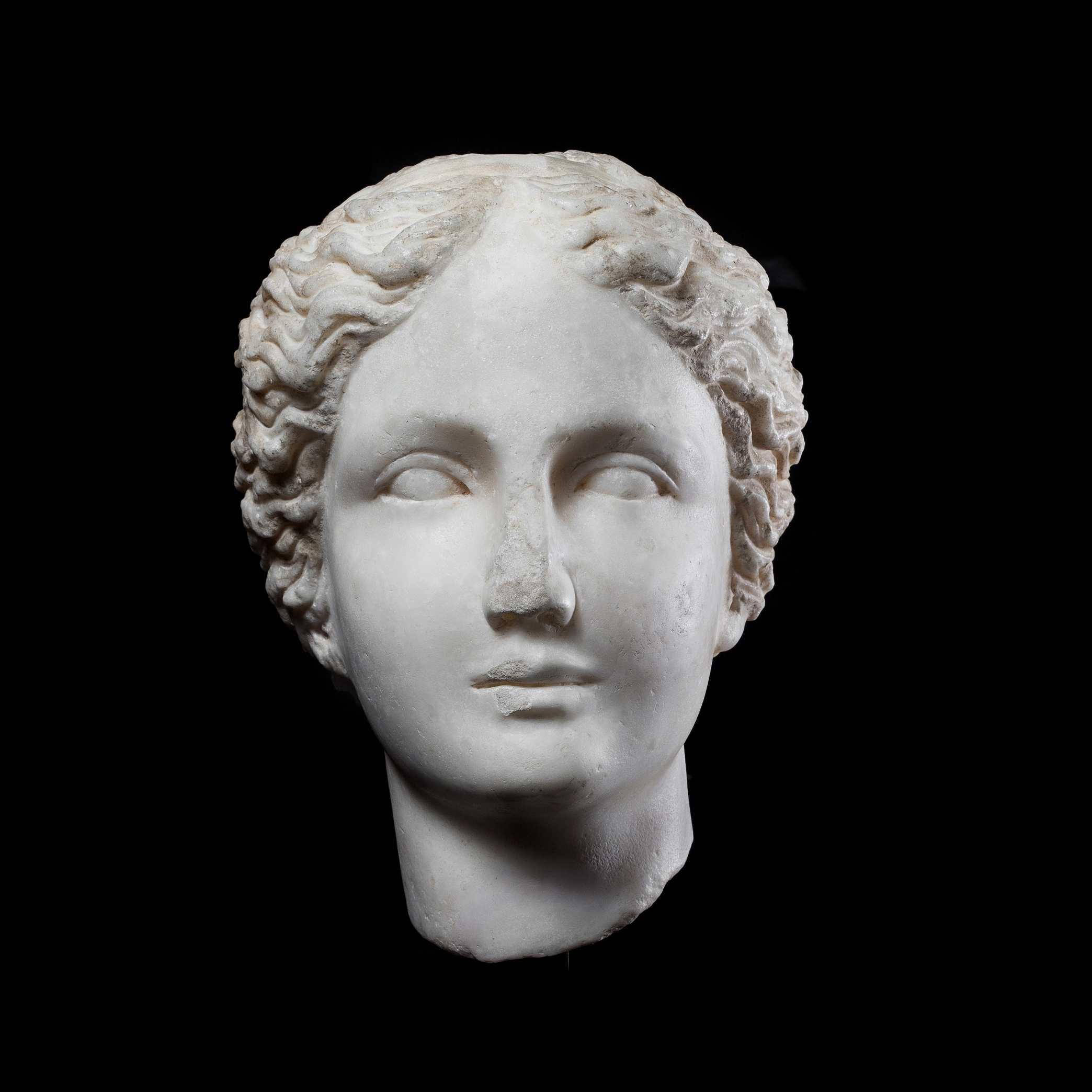 Roman Marble Head of a Young Woman