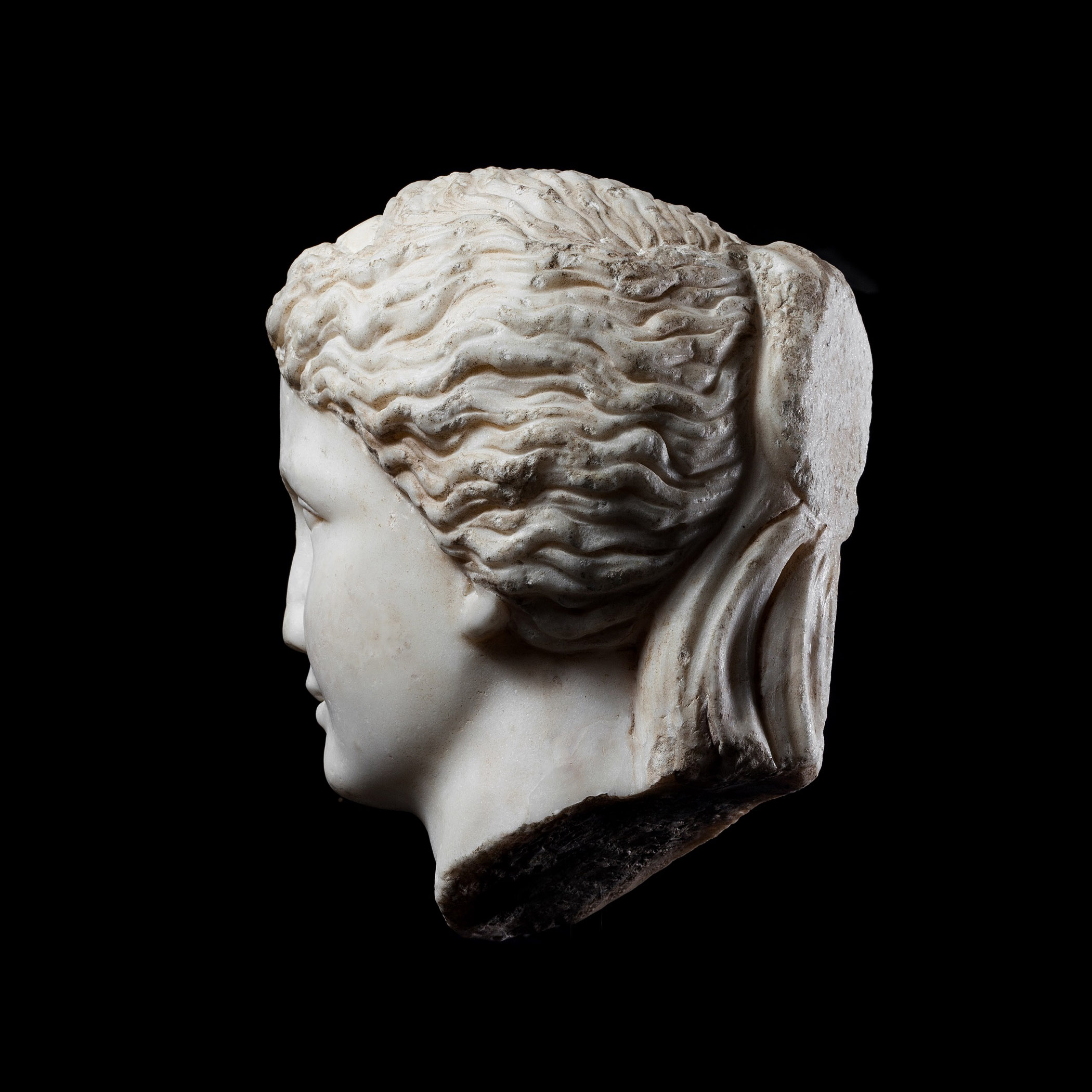 Roman Marble Head of a Young Woman