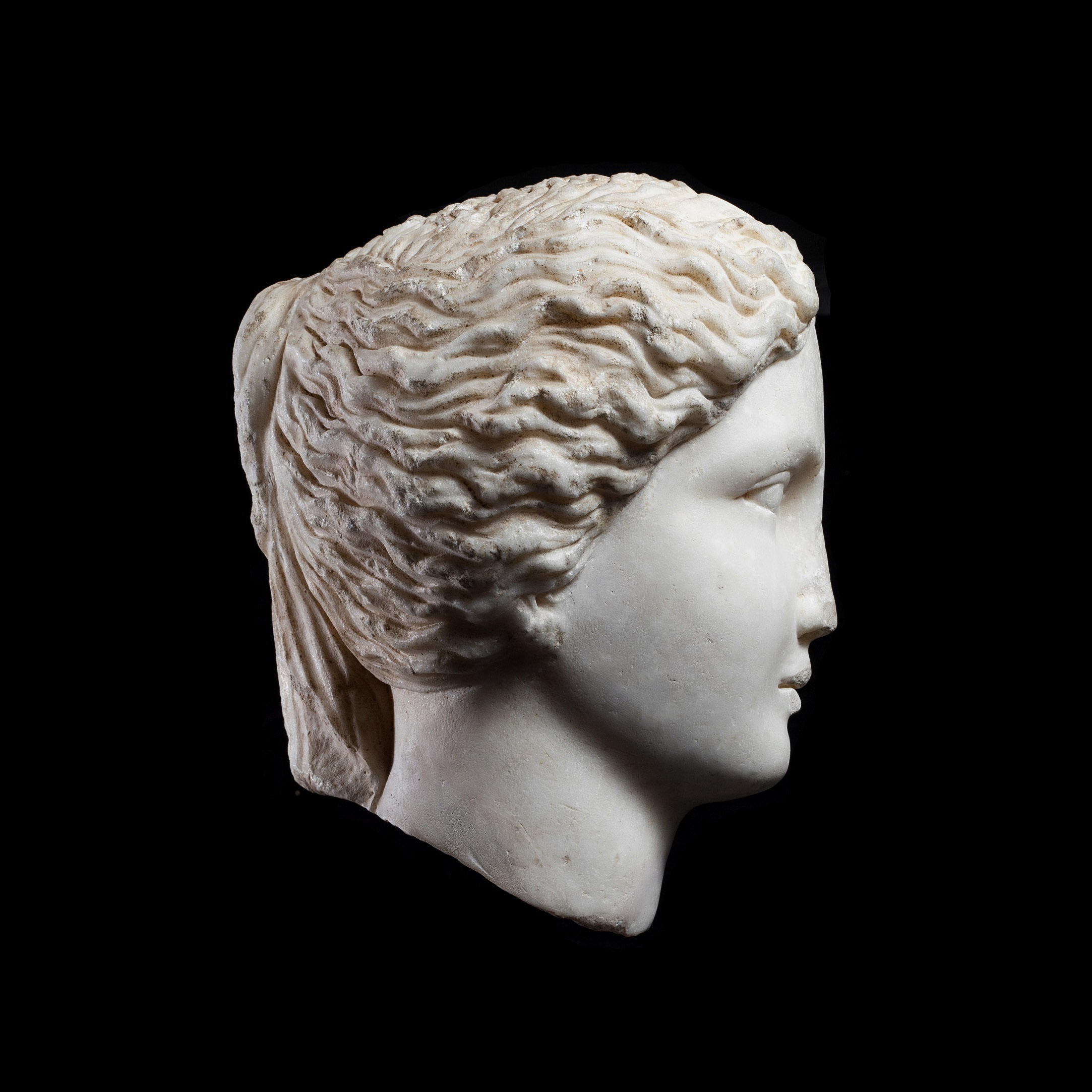 Roman Marble Head of a Young Woman
