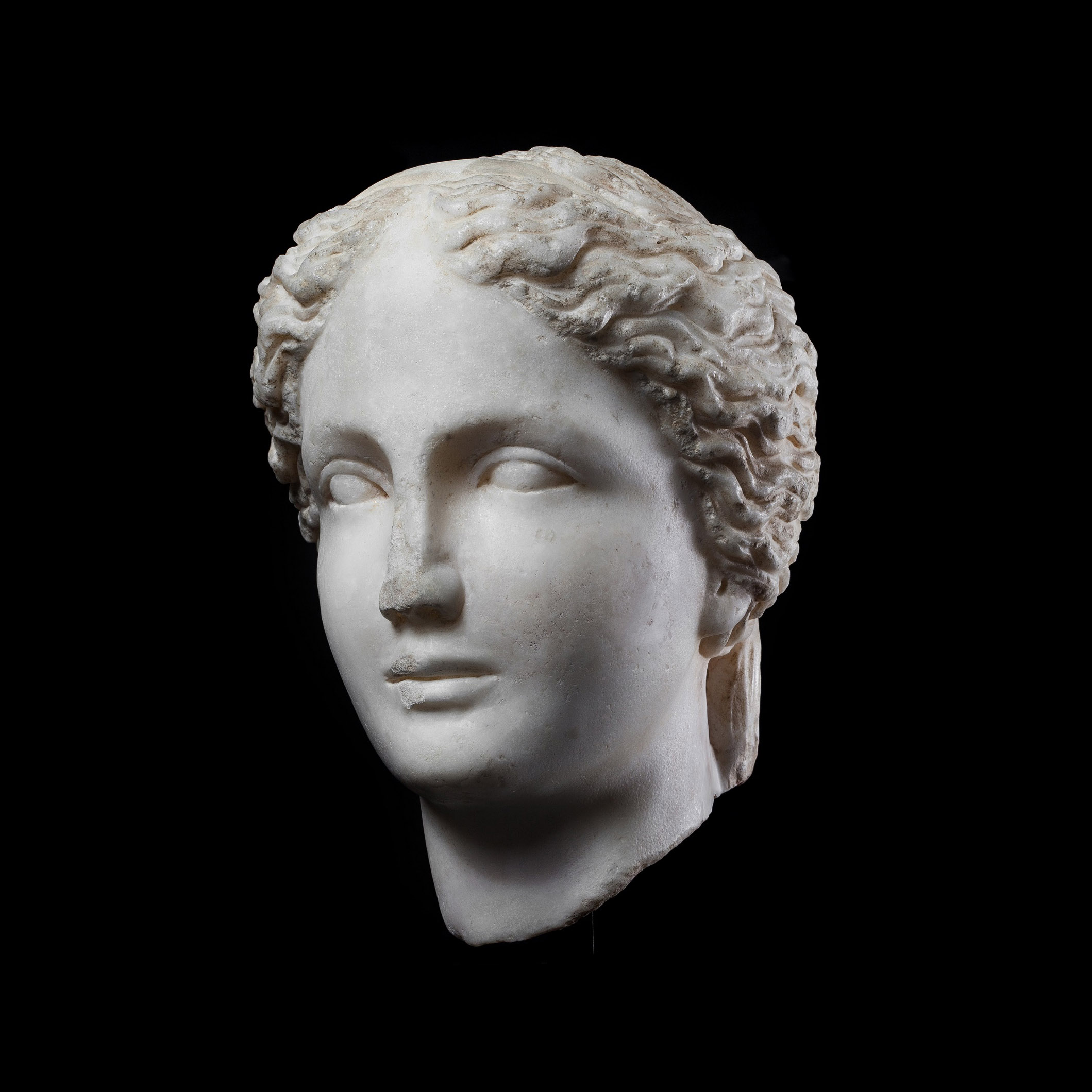 Roman Marble Head of a Young Woman