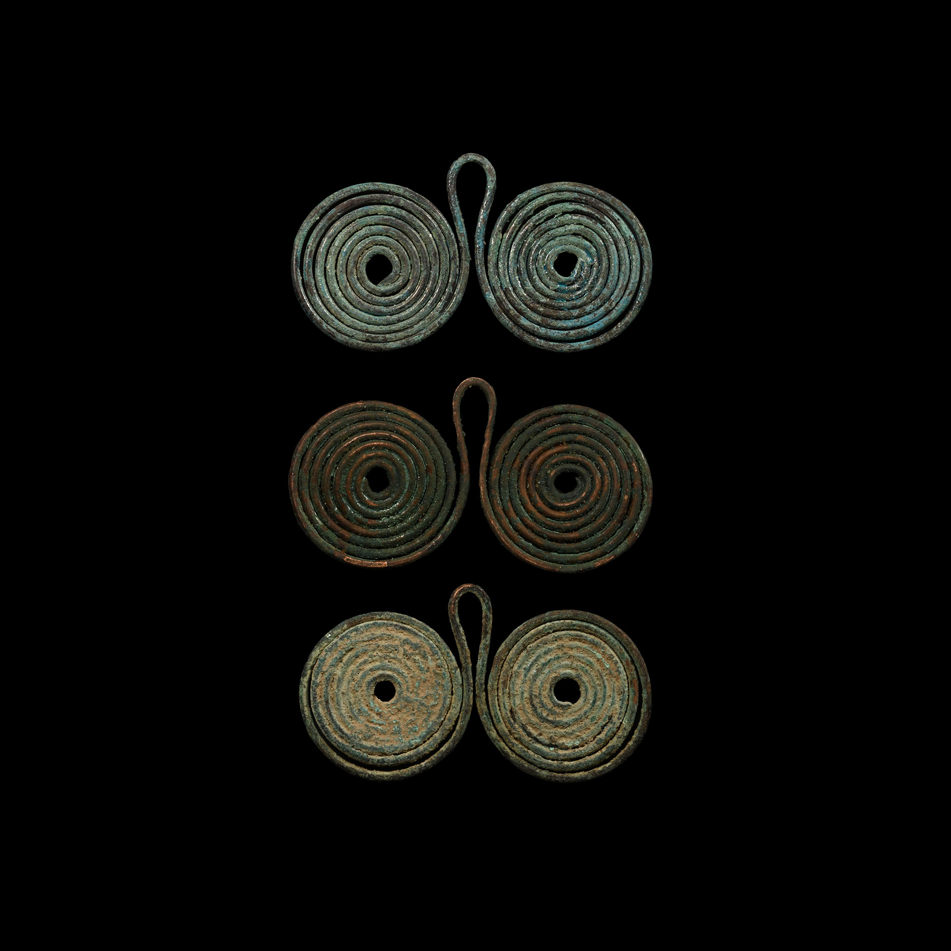 Bronze Age Coiled Spectacle Pendant Group