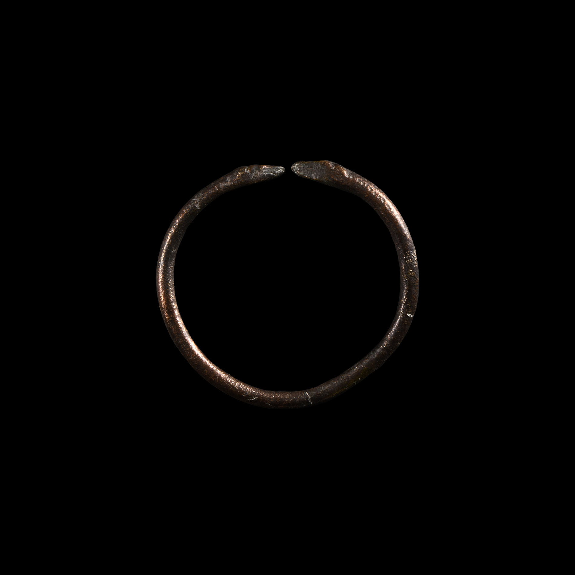 Western Asiatic Copper Bracelet with Animal Terminals