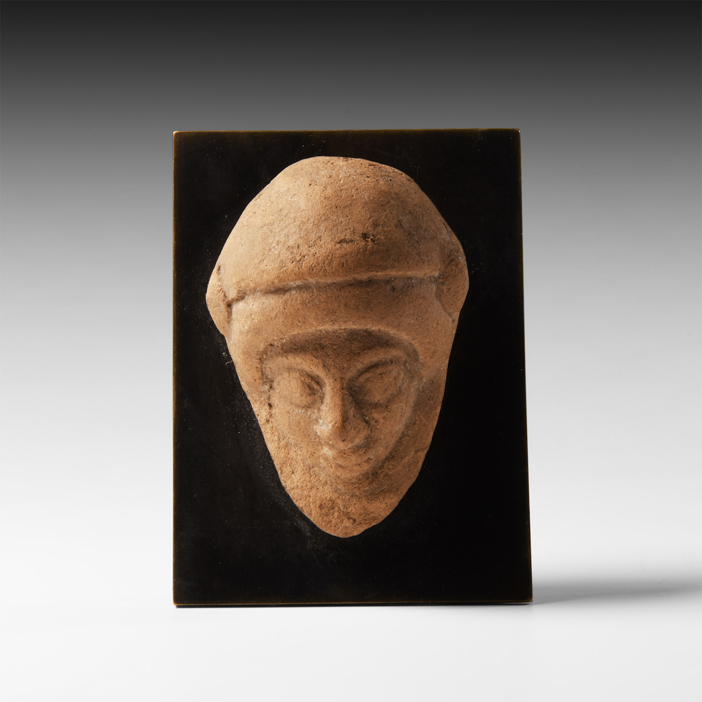 Greek Terracotta Mask with Helmet