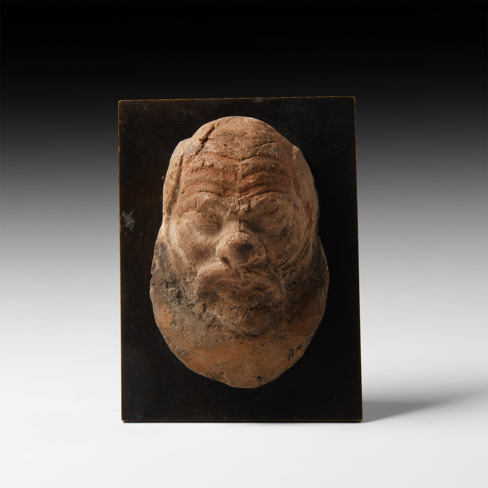 Greek Terracotta Mask of a Satyr