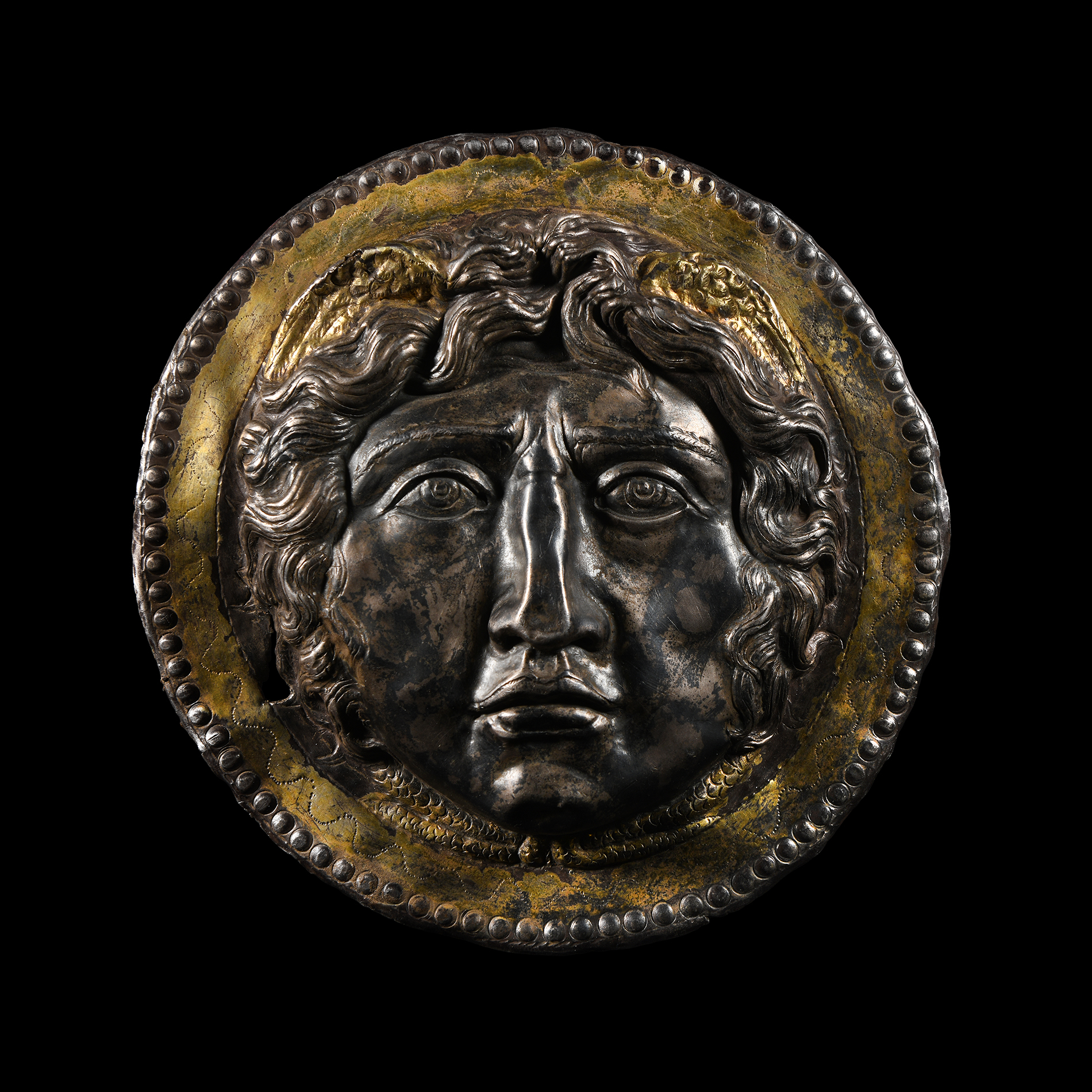 Roman Gilt-Silver Phalera with Winged Head of Medusa
