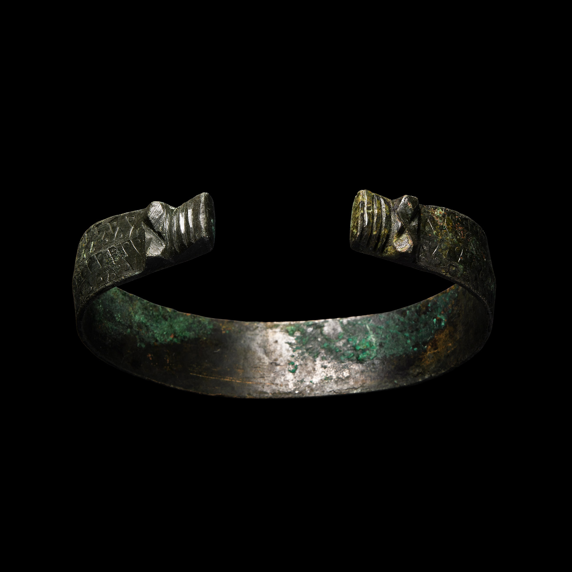 Viking Age Stamped Bronze Bracelet with Beast Head Terminals