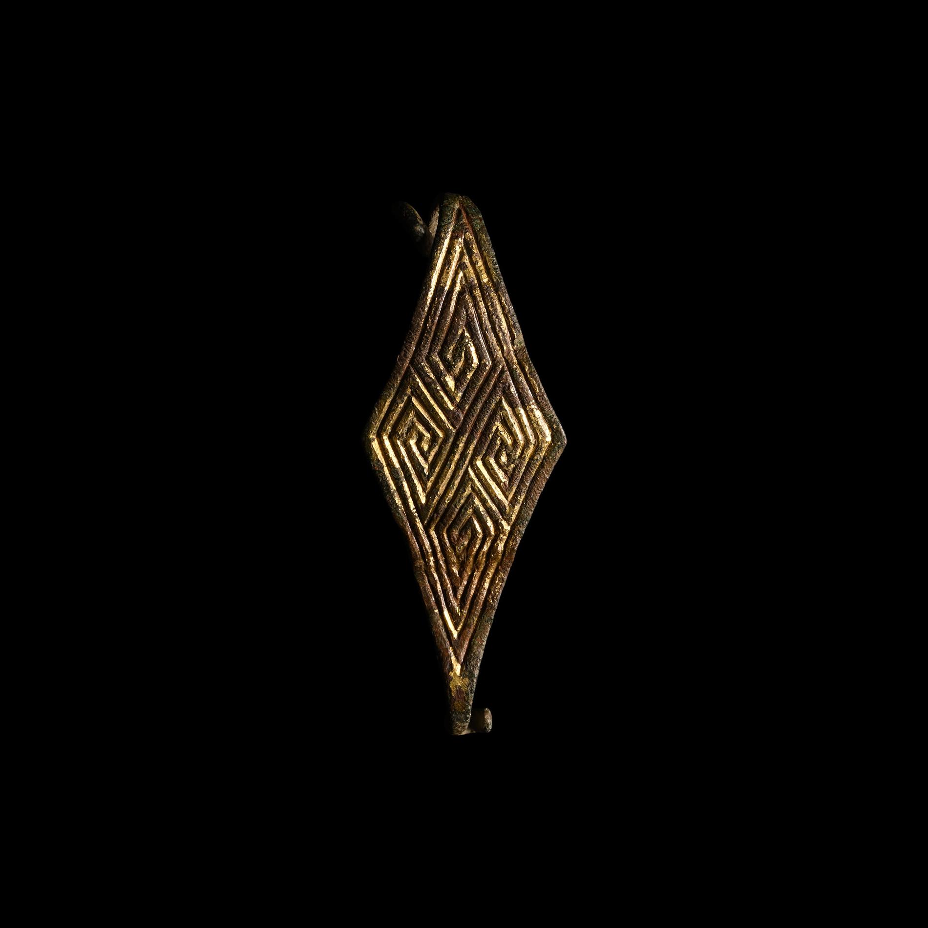 Anglo-Saxon Gilt Lozenge-Shaped Brooch with complex Diamond Design