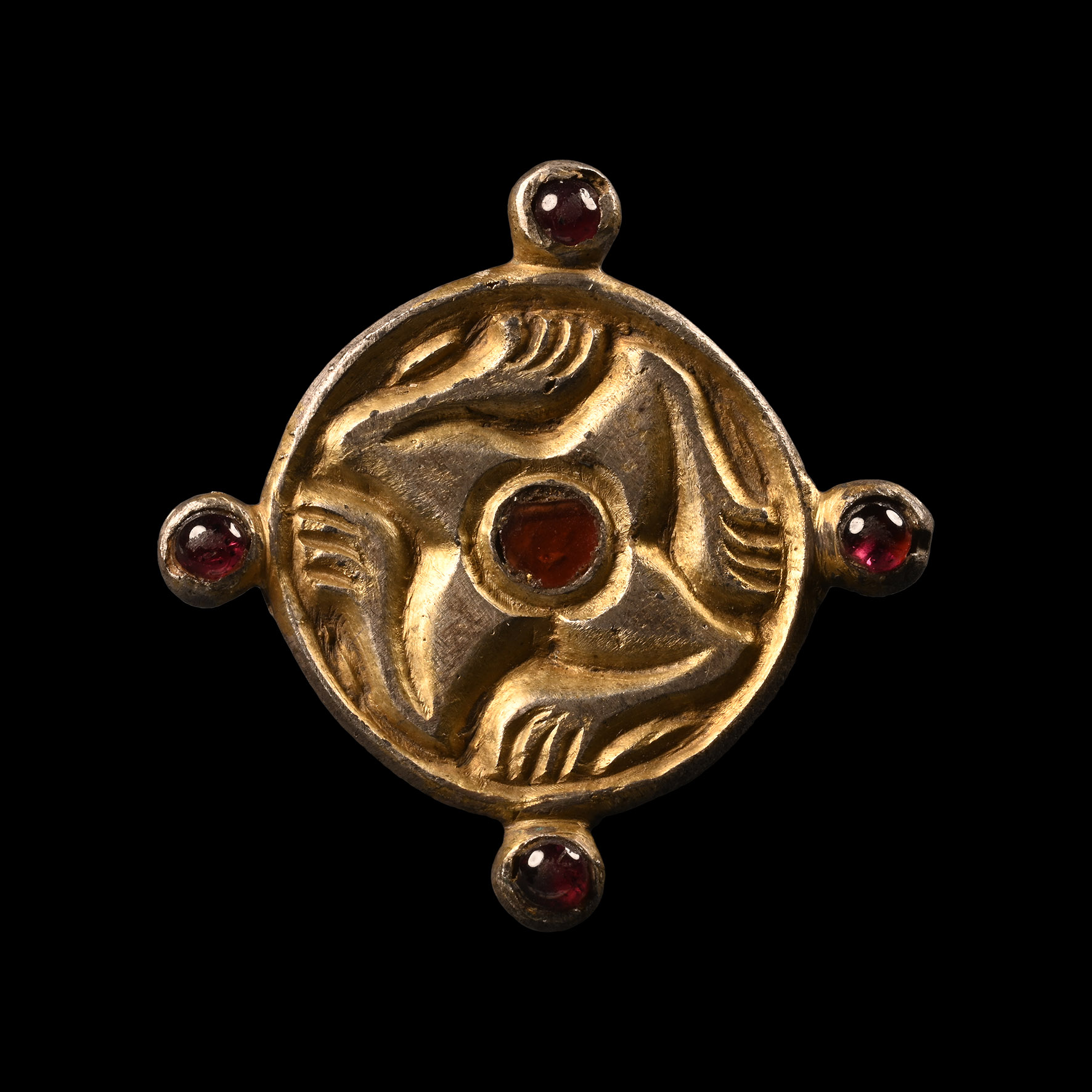 Merovingian Silver-Gilt Leg Whorl Brooch with Garnets