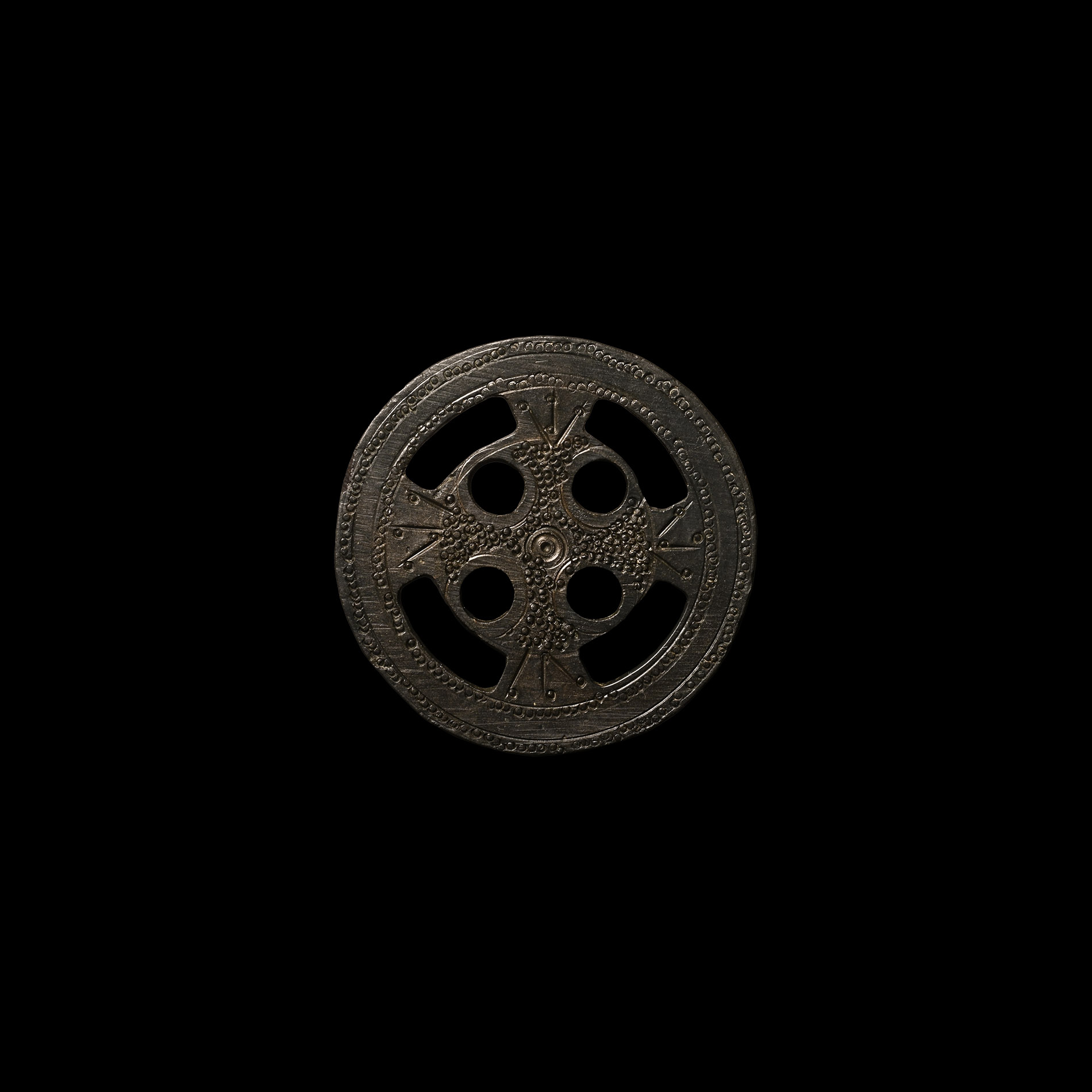 Germanic Bronze Bifacial Roundel with Stamped Cross Design