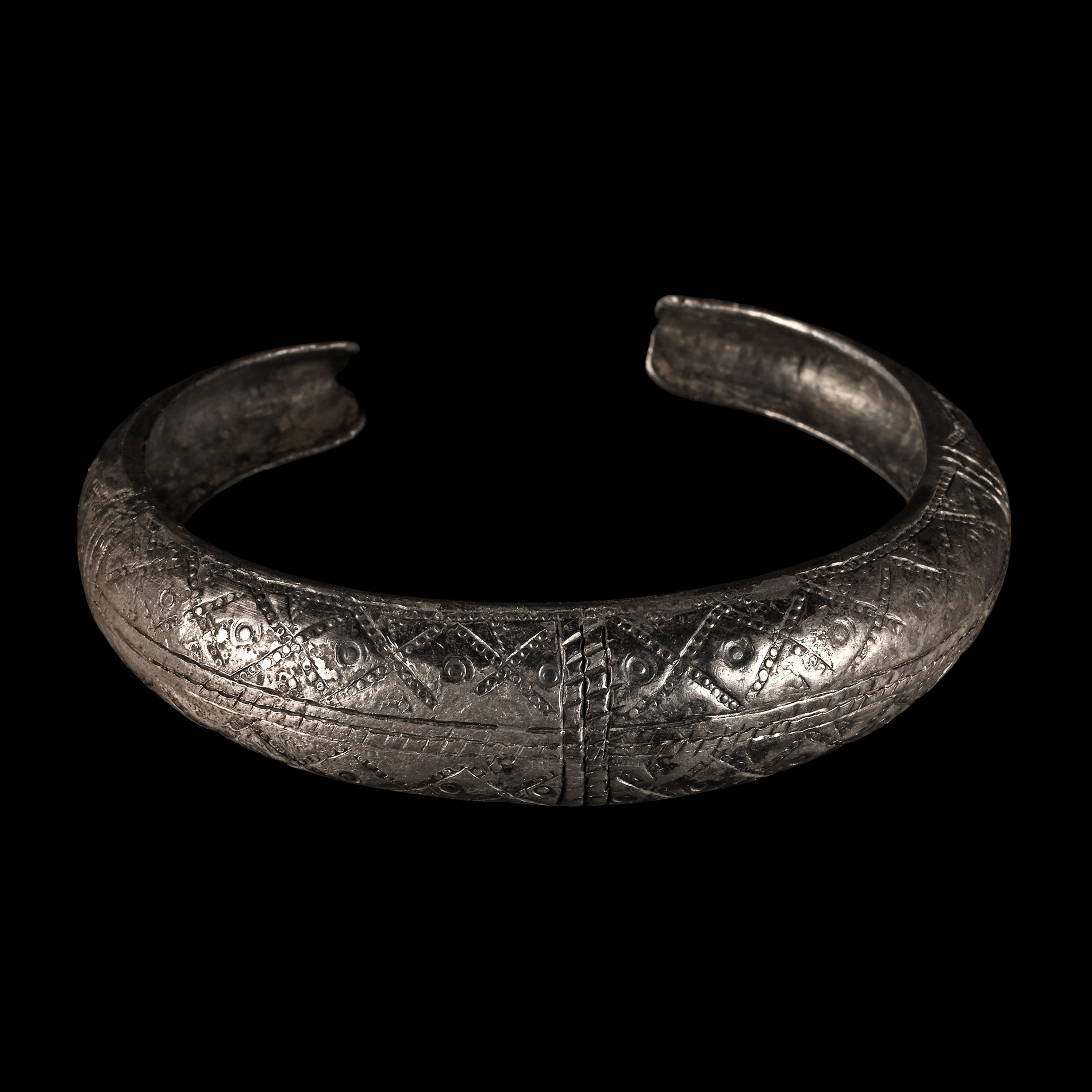 Viking Age Silver Stamp Decorated Bracelet
