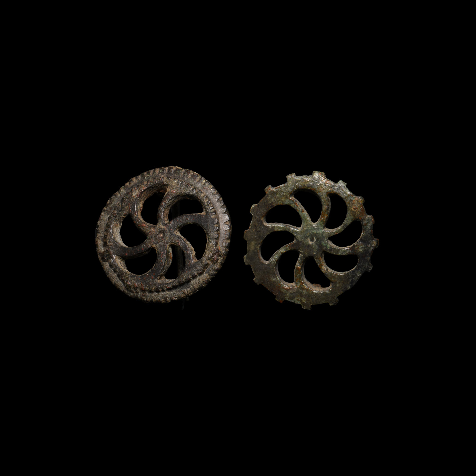 Roman Bronze Sun Whorl Brooch Group