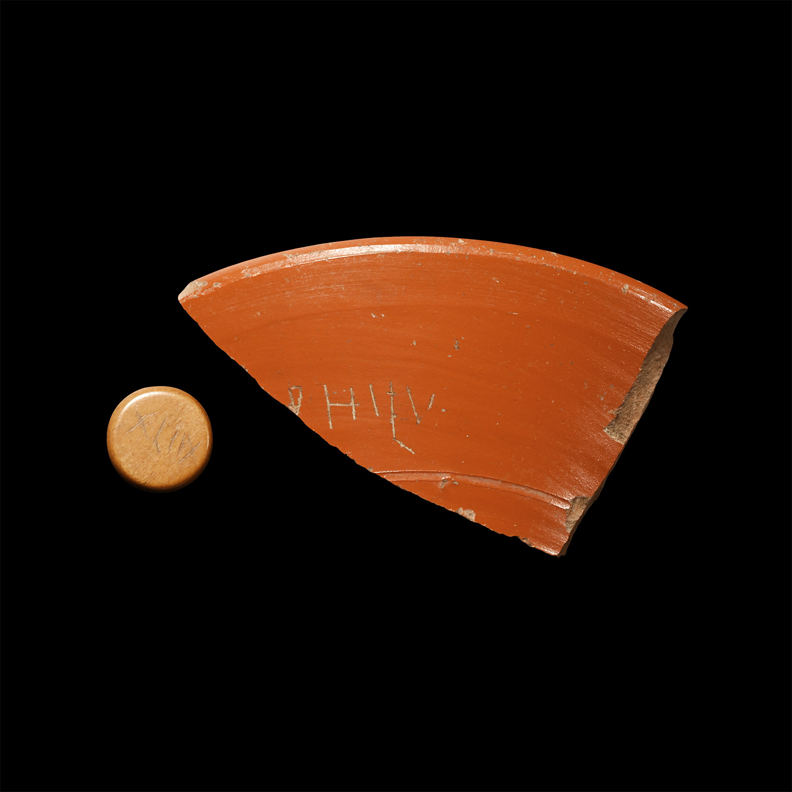 Roman 'Thames' Bone Gaming Piece and Pottery with Graffiti