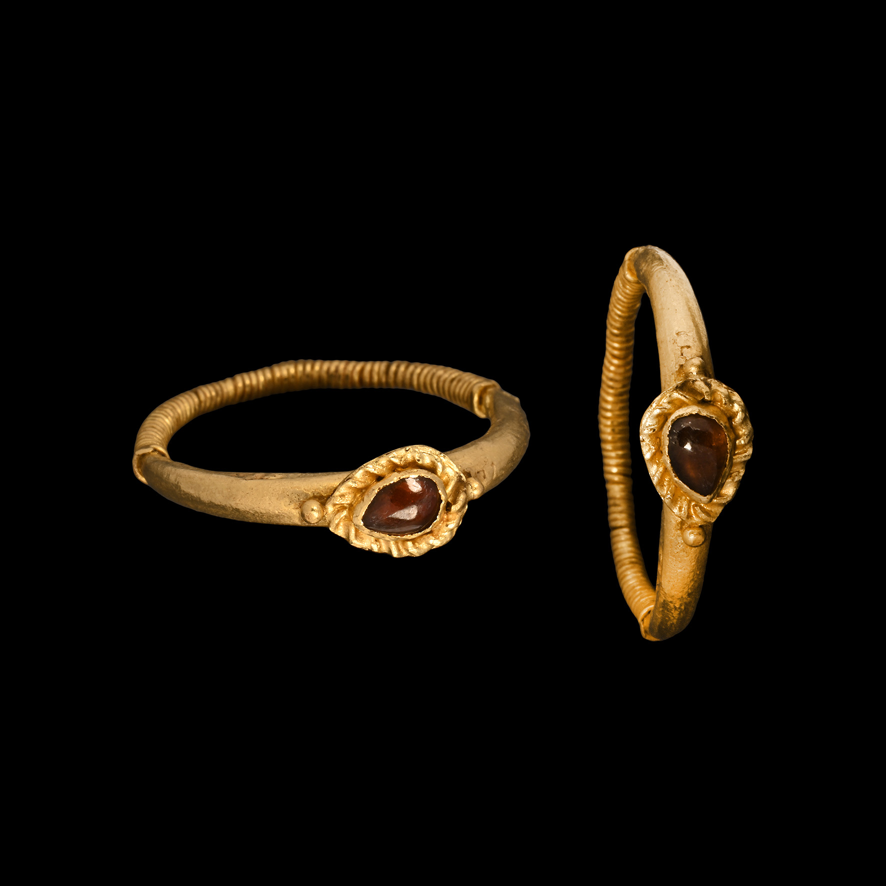 Western Asiatic Gold Ring with Garnet