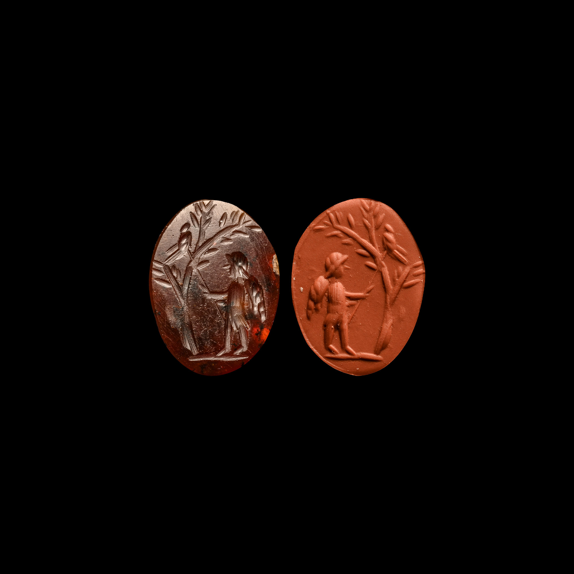 Roman Carnelian Gemstone with Eros Harassing a Bird in a Tree