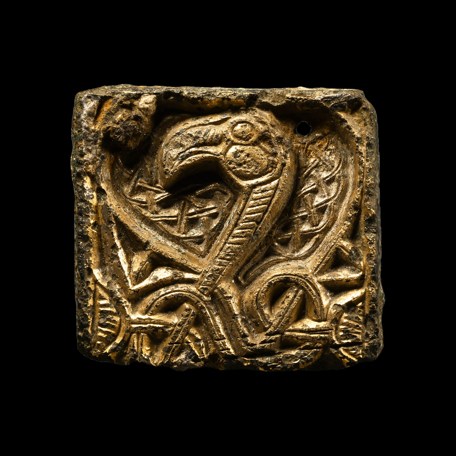 Anglo-Saxon Gilt Bronze Chip-Carved Beast Manuscript Mount