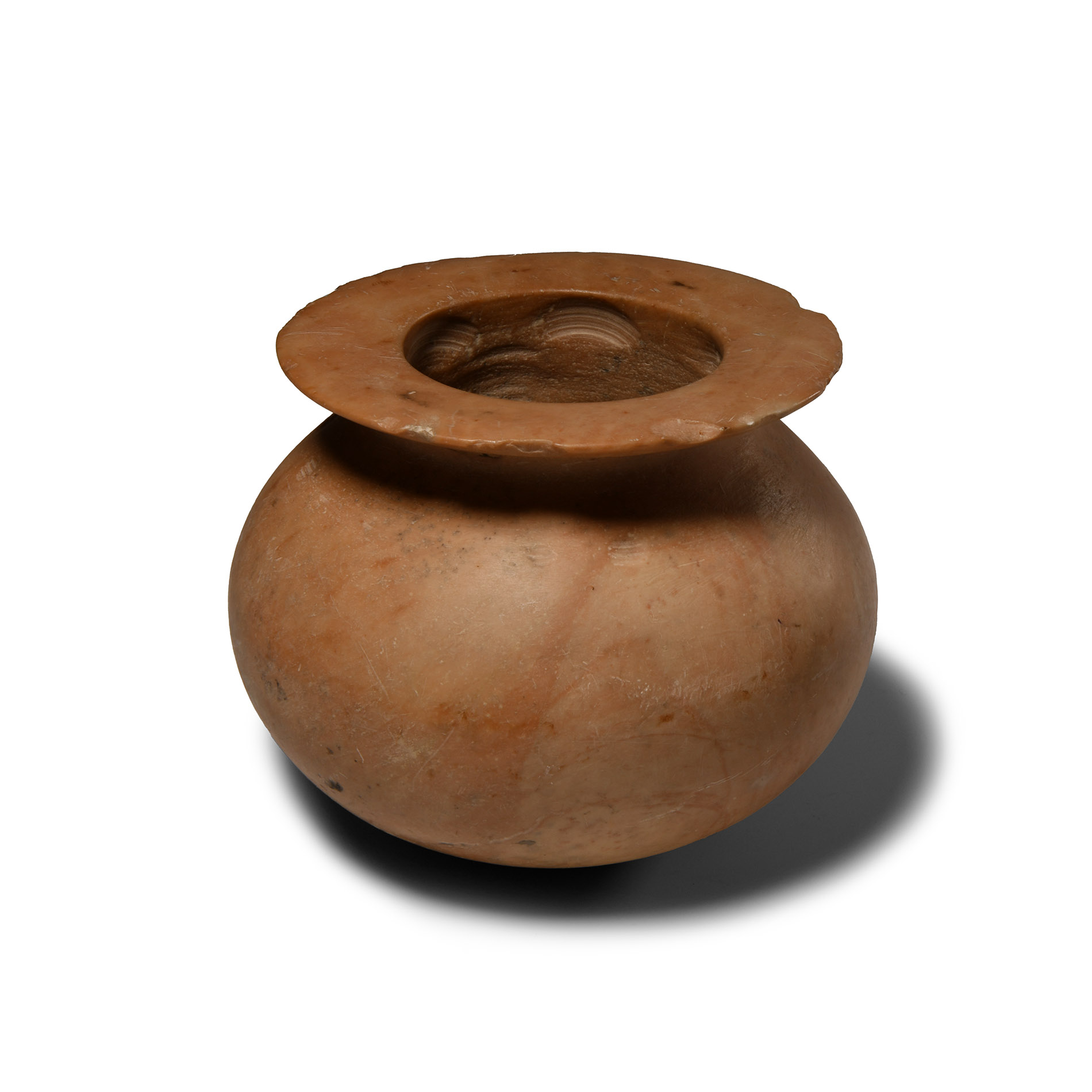 Western Asiatic Mottled Pink Stone Jar