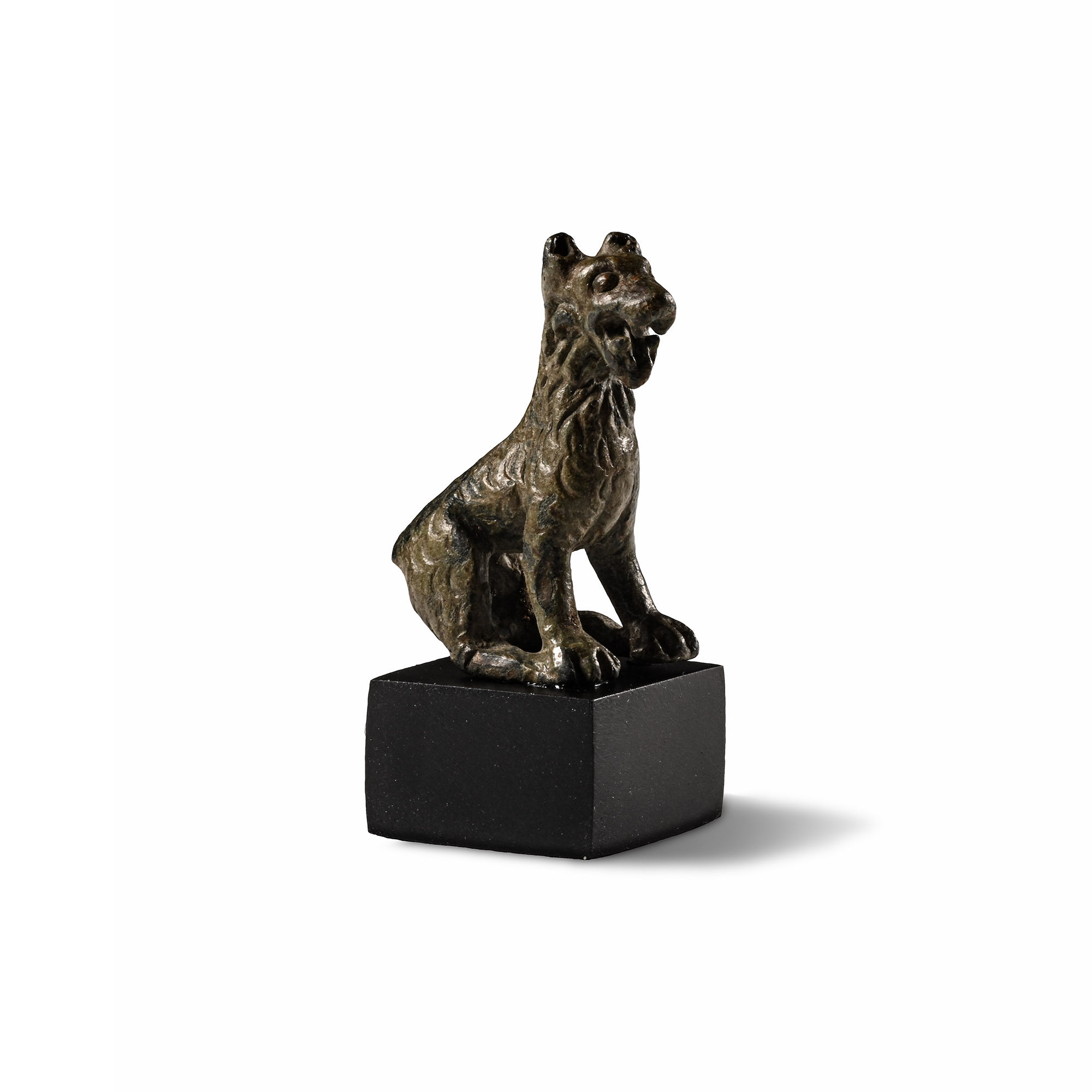 Roman Bronze Seated Long-Haired Dog Statuette