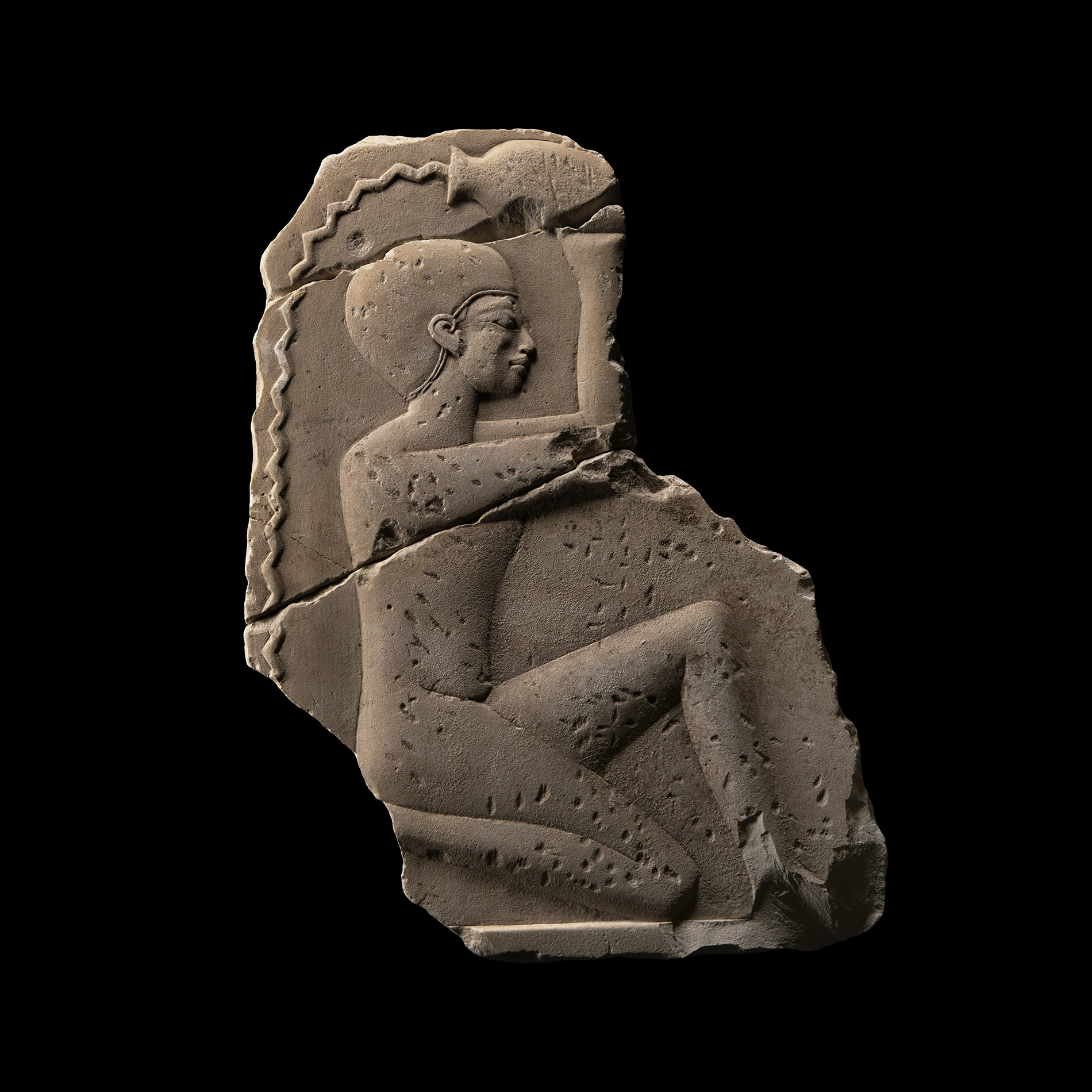 Egyptian Limestone Figural Temple Relief