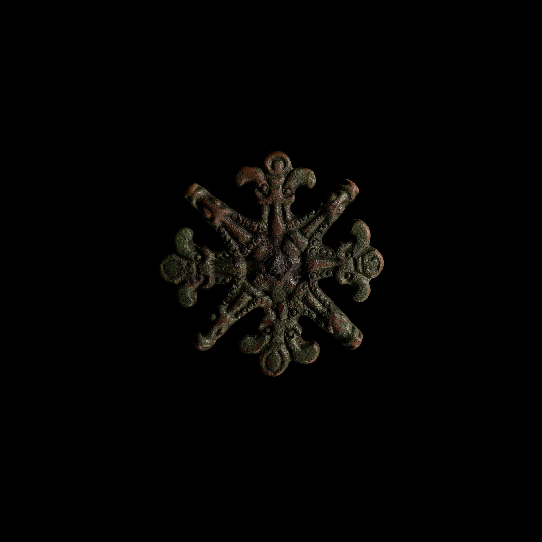 Anglo-Saxon Bronze Shield Mount with Animal Masks and Beast Heads