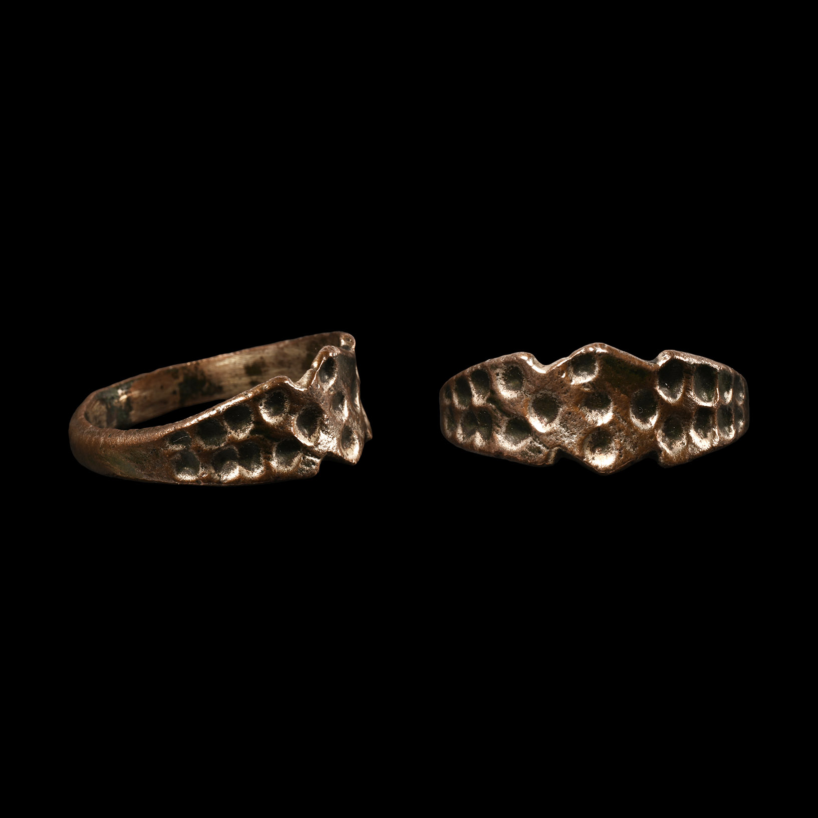 Viking Age Bronze Ring with Stamped Design