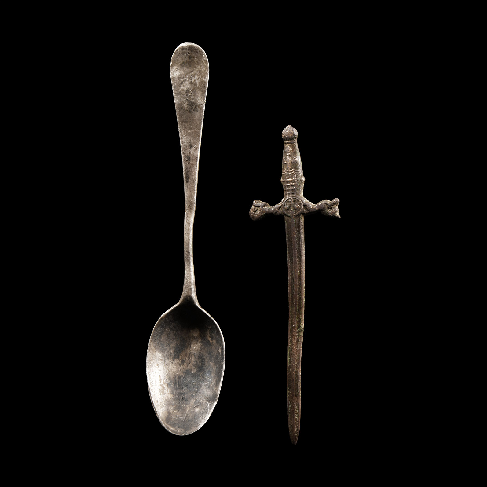 Post Medieval Silver Spoon with Monogram and Bronze Sword Retainer's Badge
