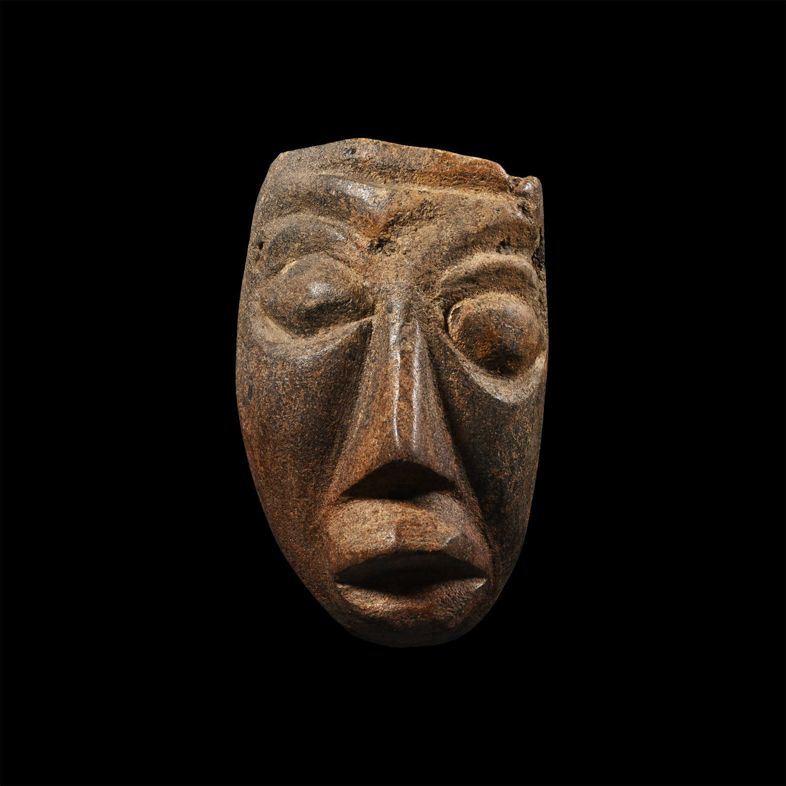 Natural History - Mastodon Bone Face Carving