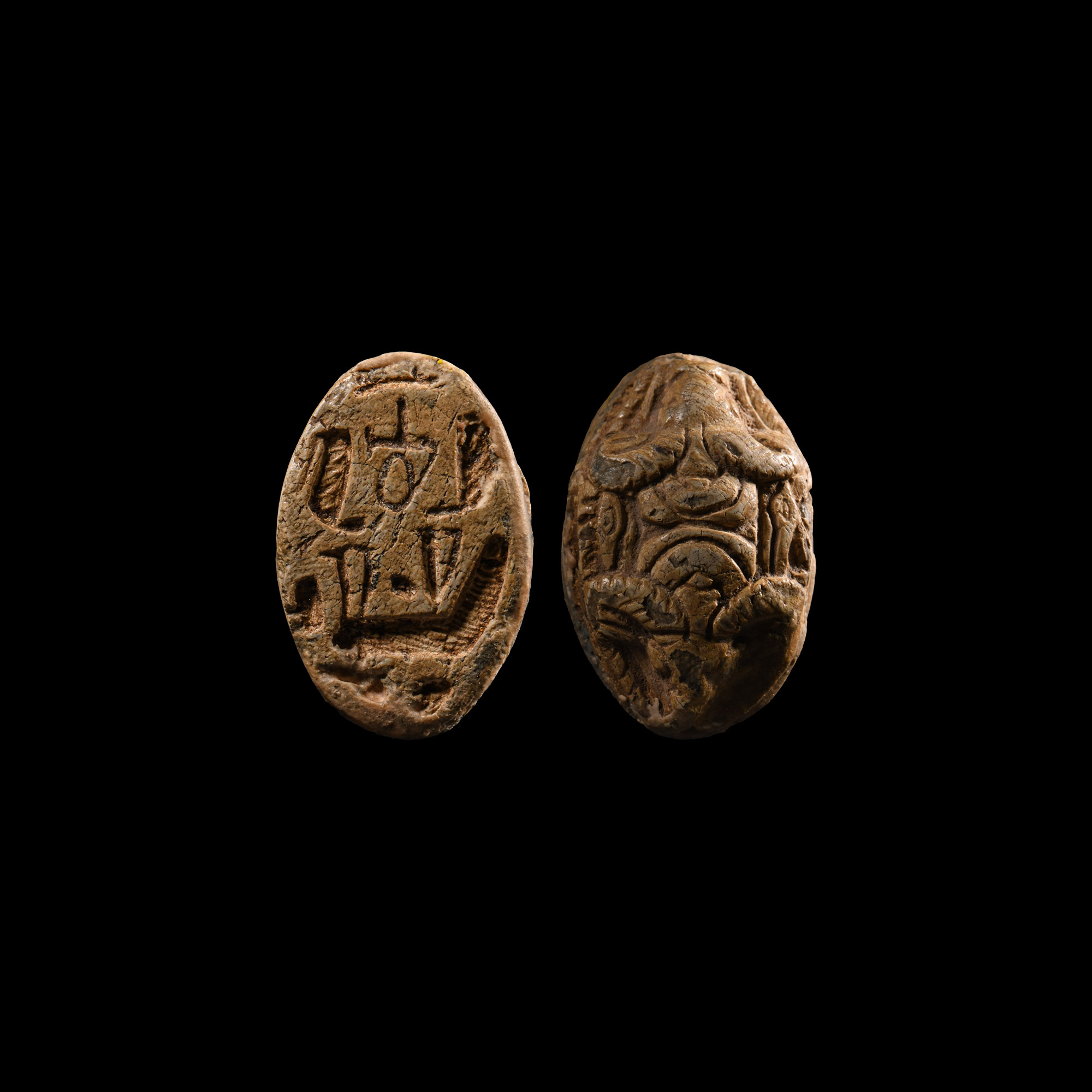 Egyptian Zoomorphic Stone Scaraboid with Animal Heads and Hieroglyphs