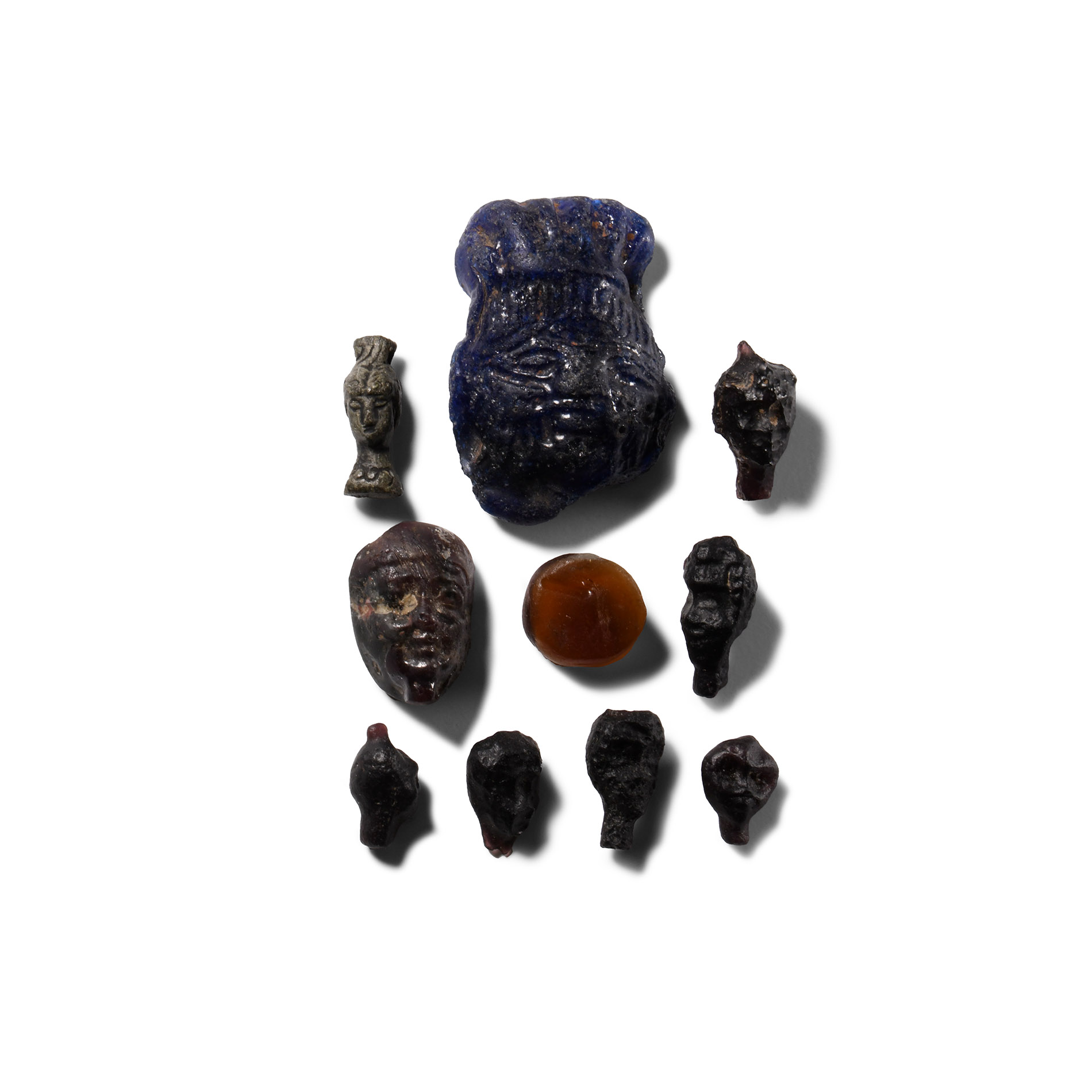 Romano-Egyptian Glass Head Amulet and Gem Collection