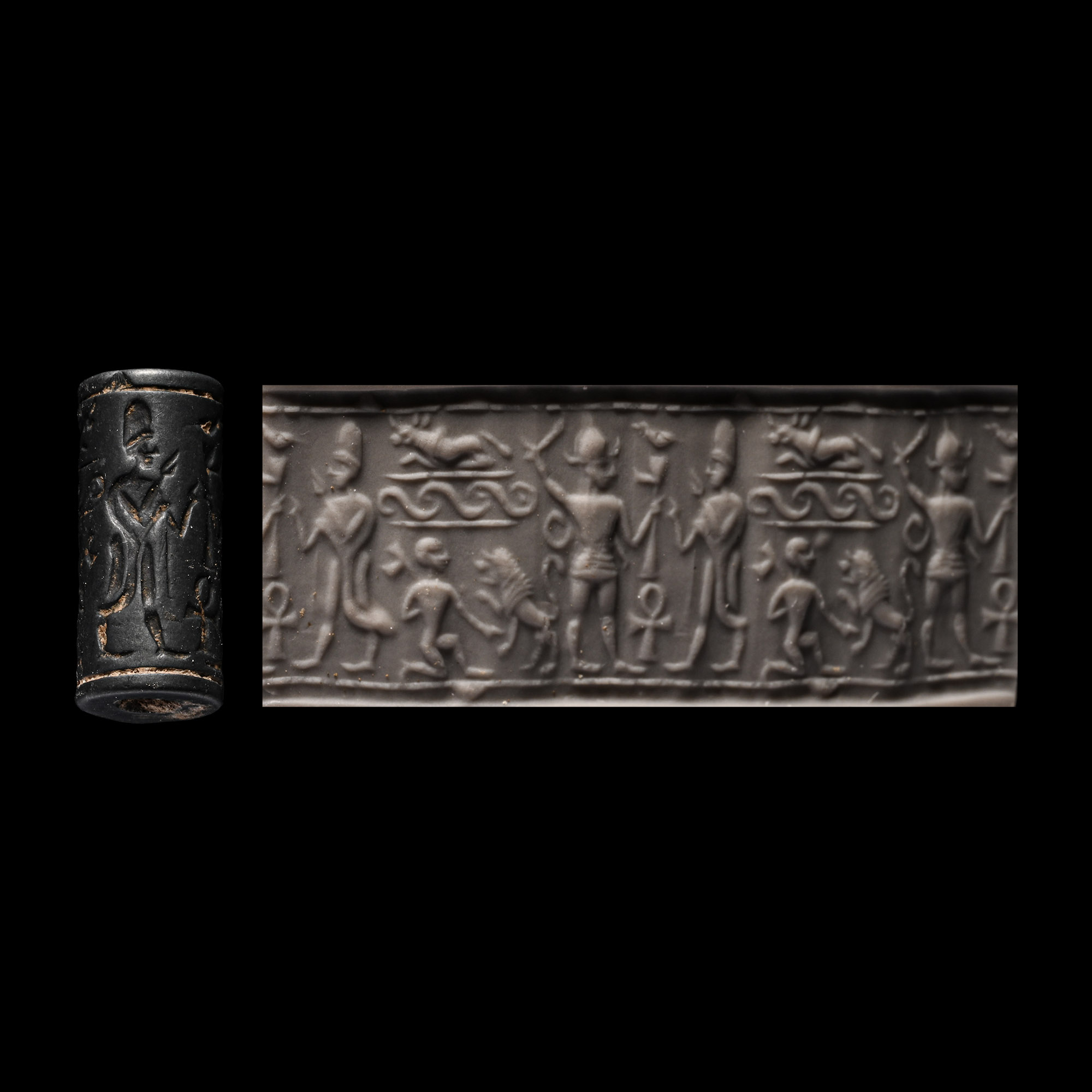 Western Asiatic Haematite Cylinder Seal with Presentation Scene