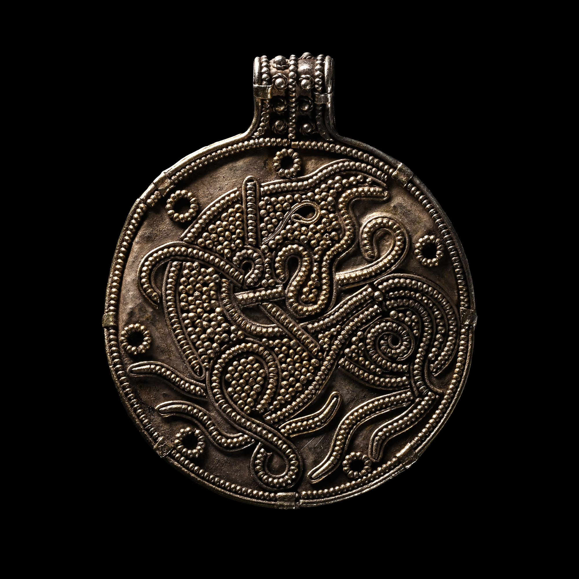 Large Viking Age Silver Pendant with Beast Facing Back