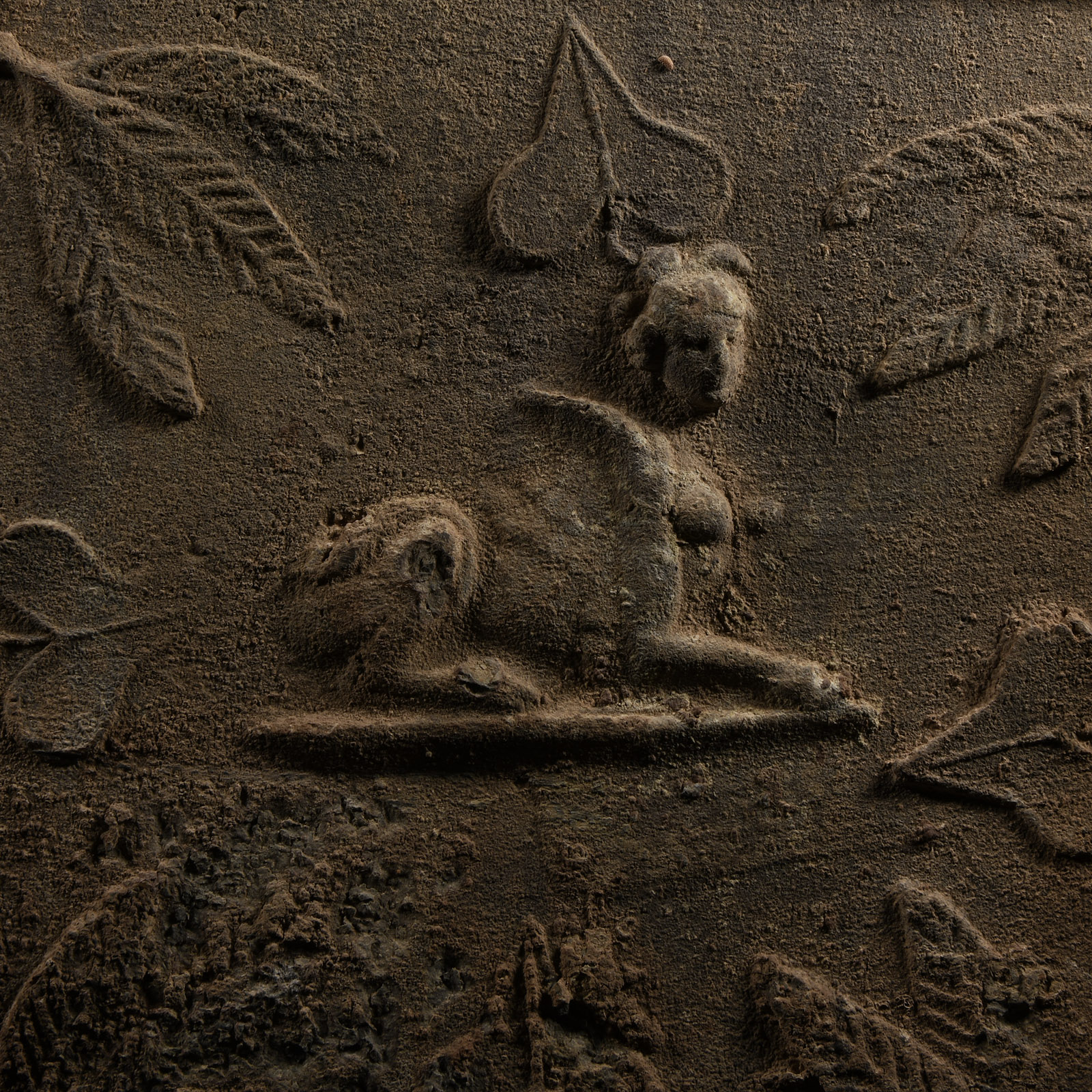 Roman Lead Coffin Fragment with Sphinx, Medusa and Dolphins