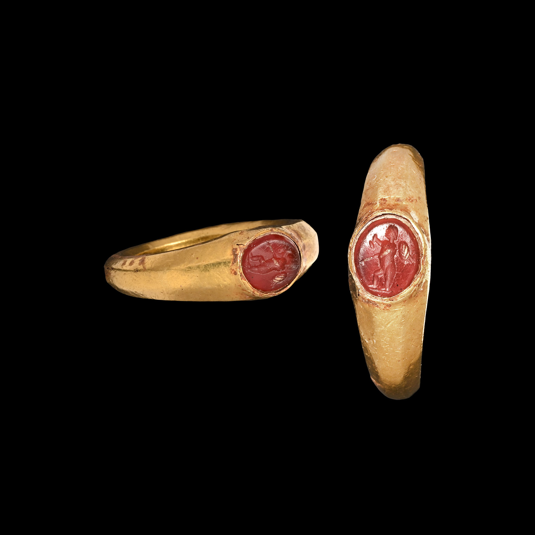 Roman Gold Ring with Winged Eros Gemstone