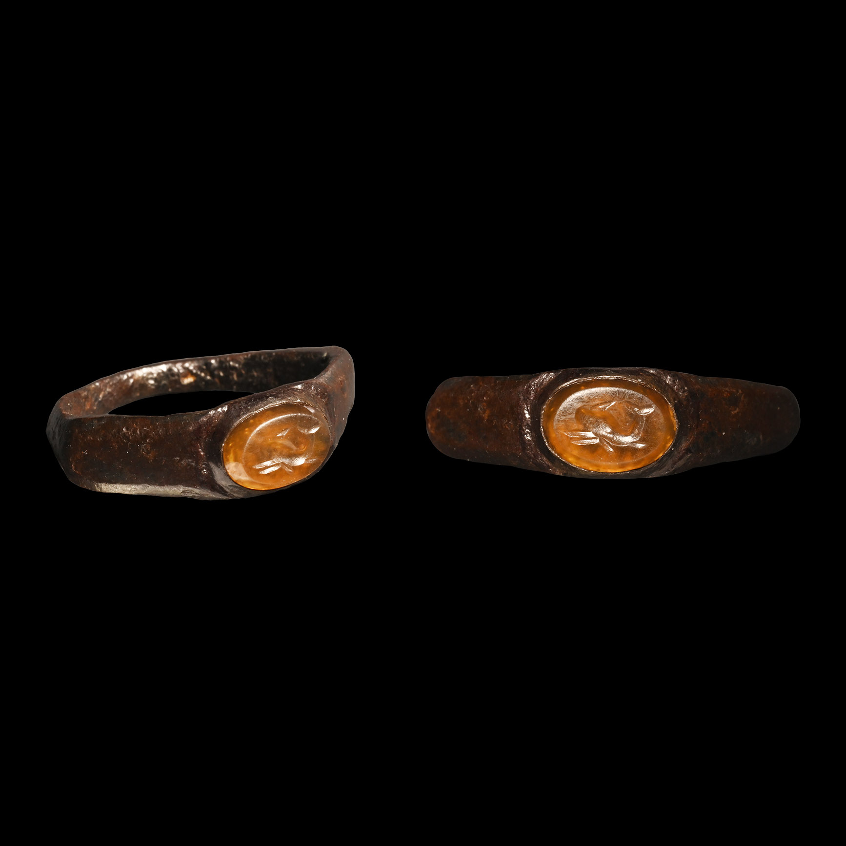 Late Roman Bronze Ring with Dolphin Gemstone