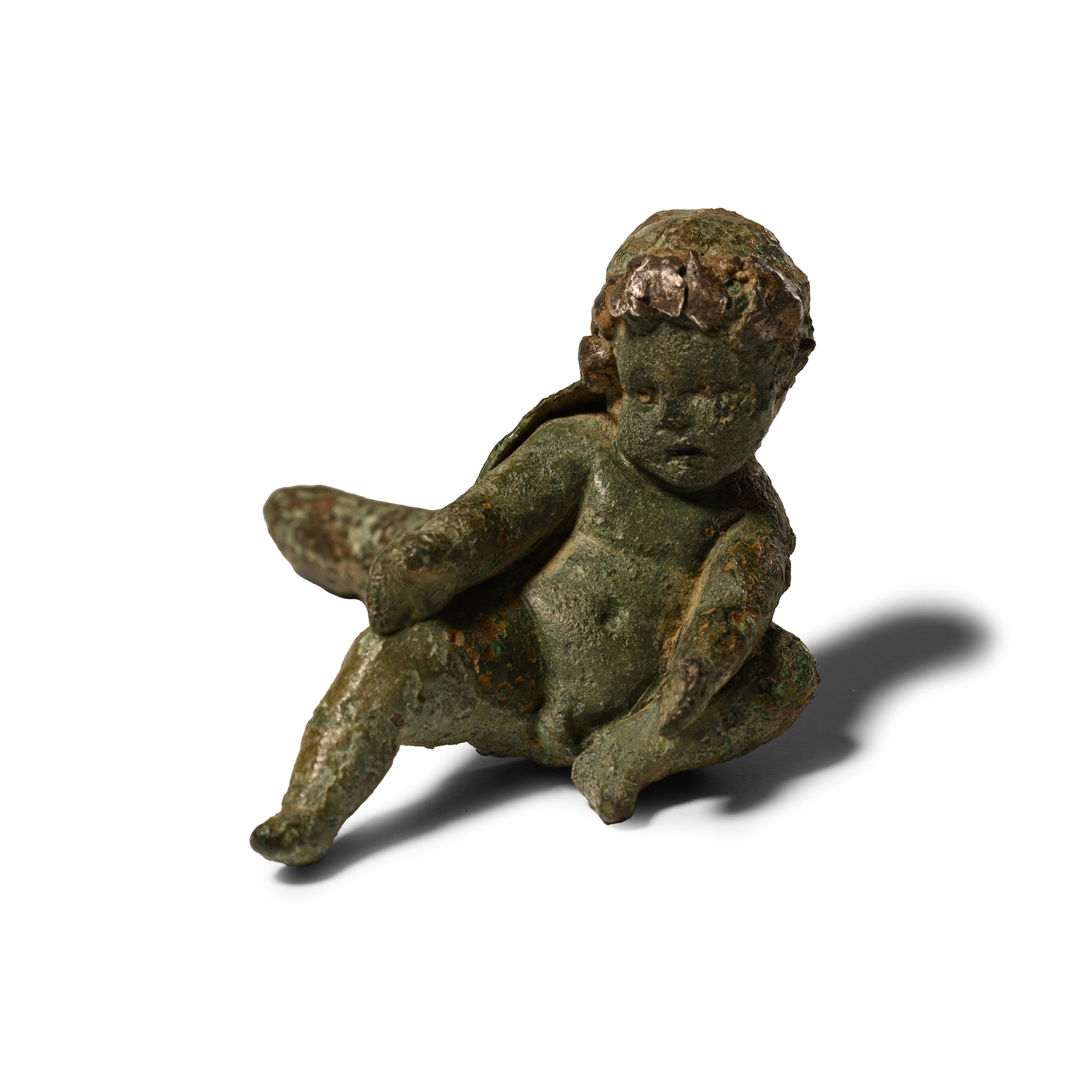 Roman Bronze Figure of a Boy with Silver Inlays