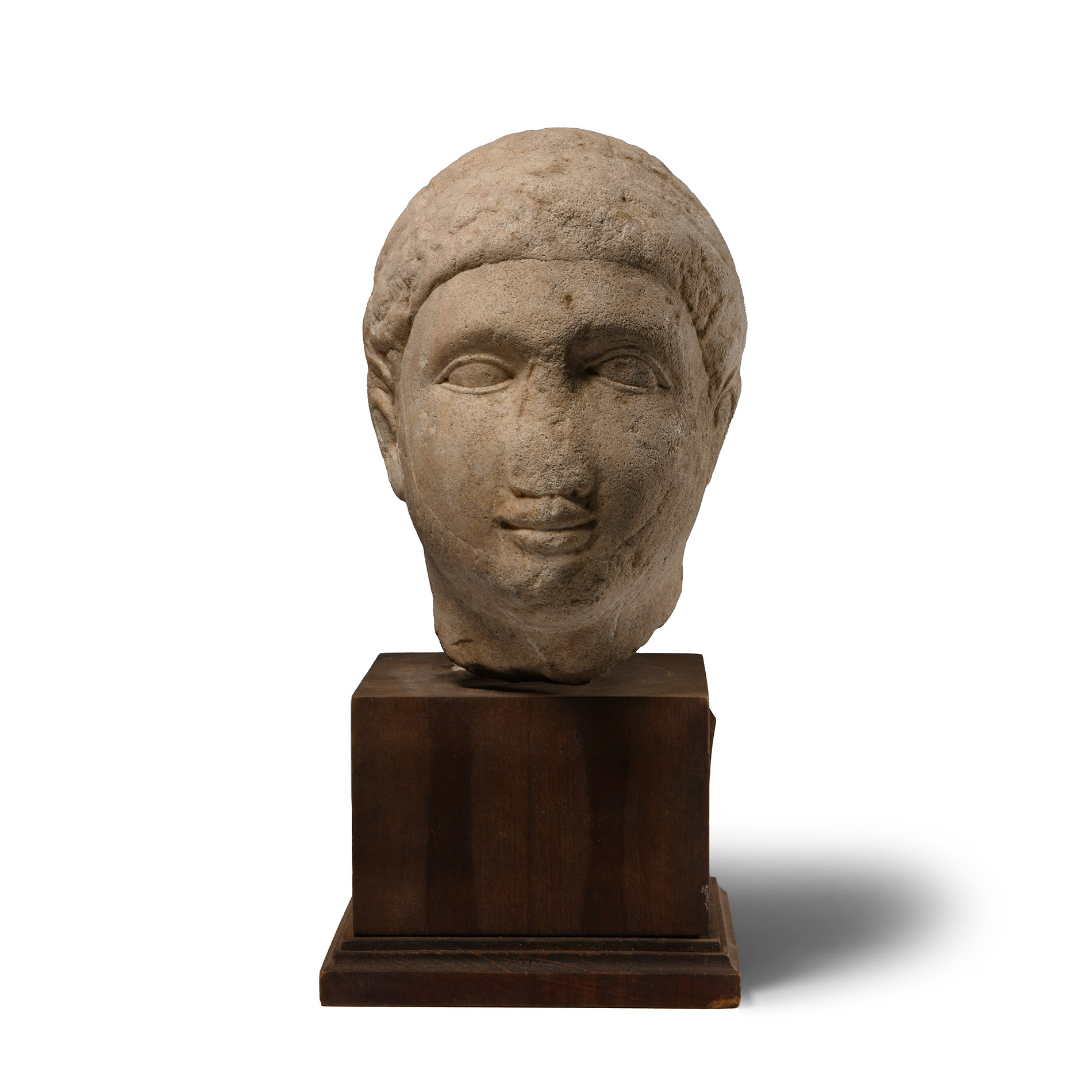 Cypriot Votive Limestone Head of a Young Man