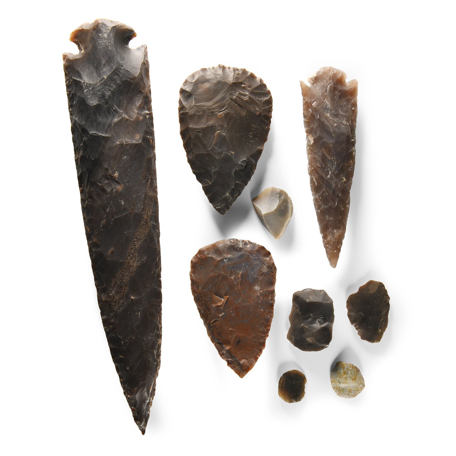Stone Age Flint Scrapers with Reproduction Axes and Spearheads