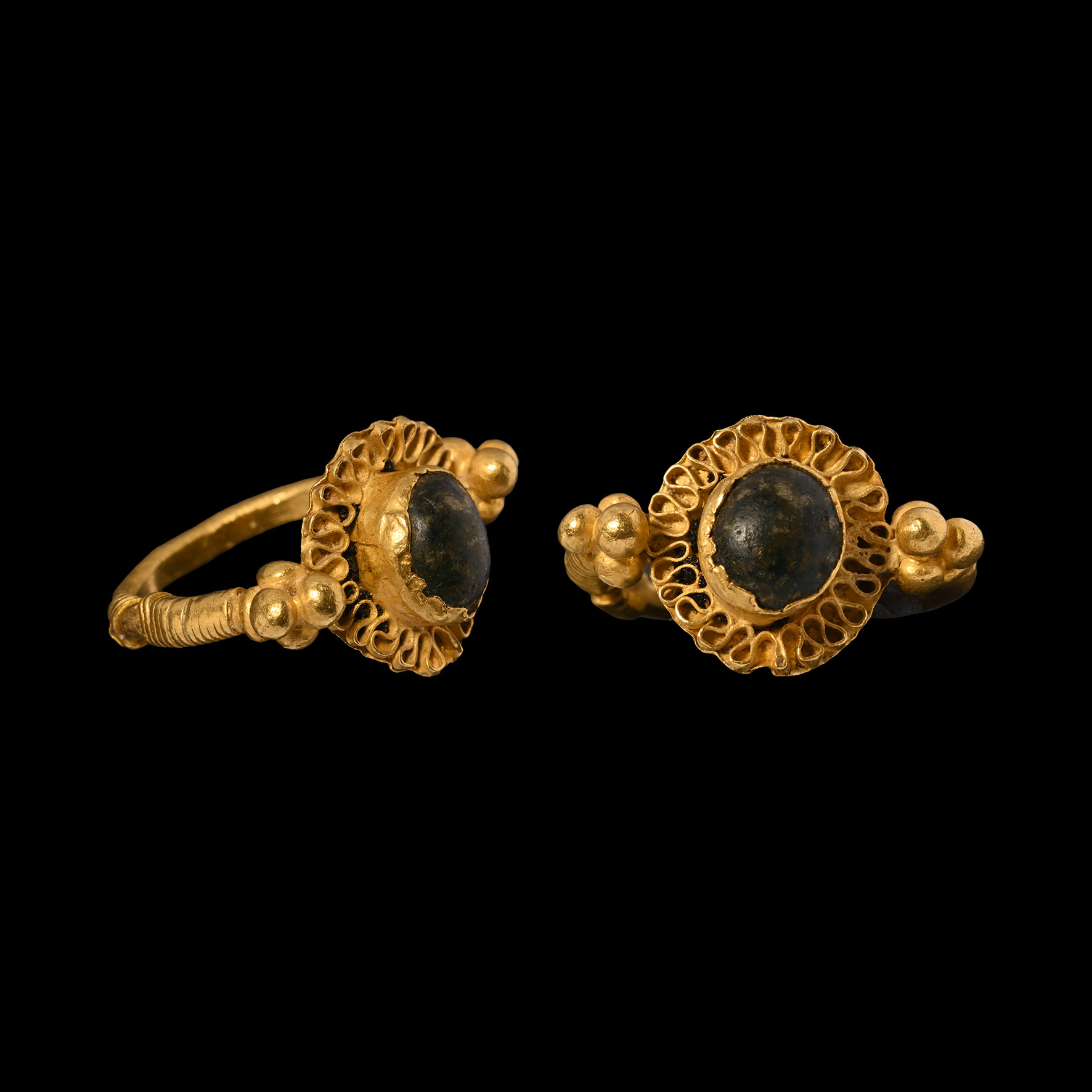 Late Roman or Merovingian Gold Ring with Rosette and Green Cabochon