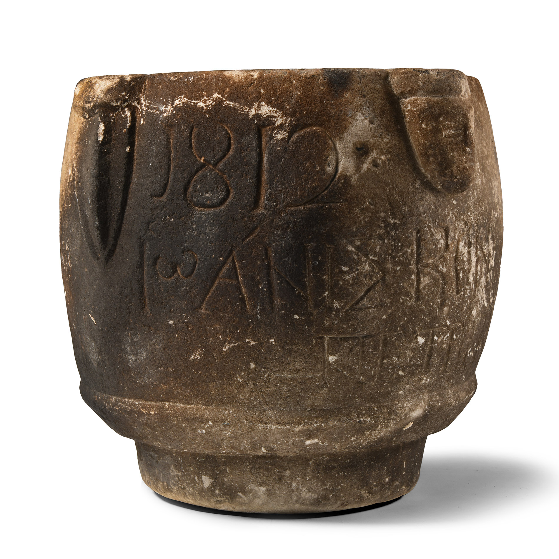 Byzantine Limestone Mortar with Faces and Later Dedication